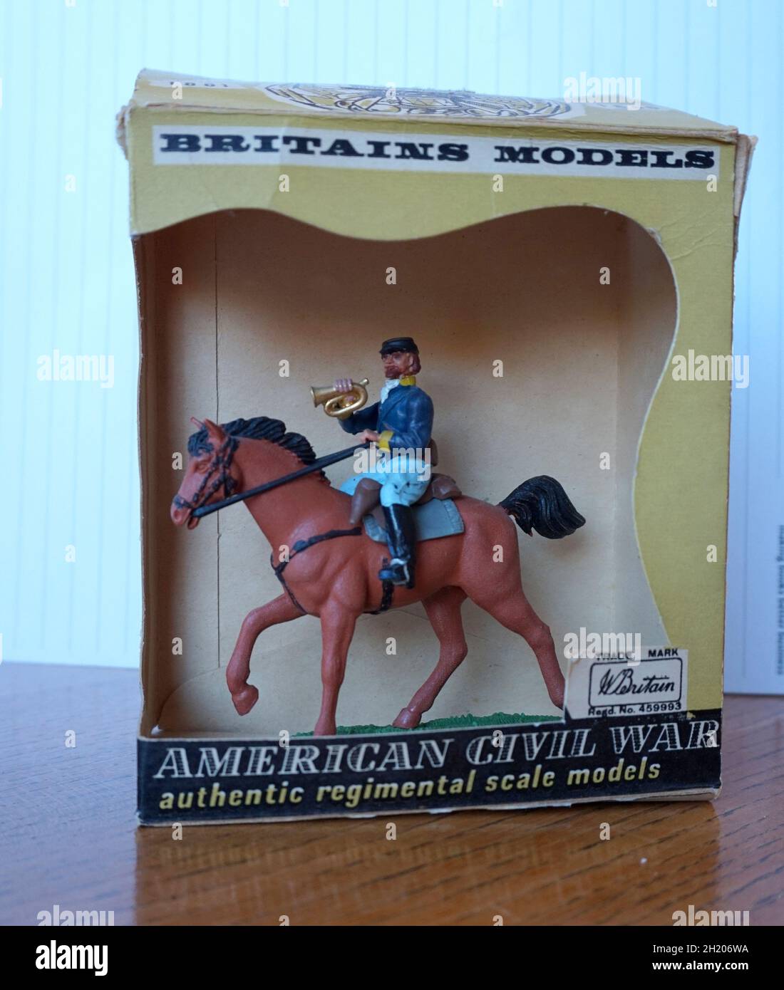 This is one of the many toys and figures produced by the firm of W. Britain.  The cavalryman was one of a set devoted to the American Civil War, launched in the mid-Sixties to replace an older range of solid figures.  original price of 3s 11d, designed and manufactured in England. In original packaging, now very collectable. Stock Photo