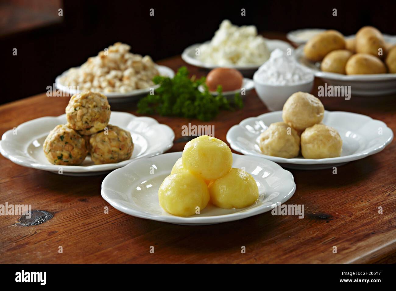 Bread dumpling, potato dumplings and quark dumplings with ingredients
