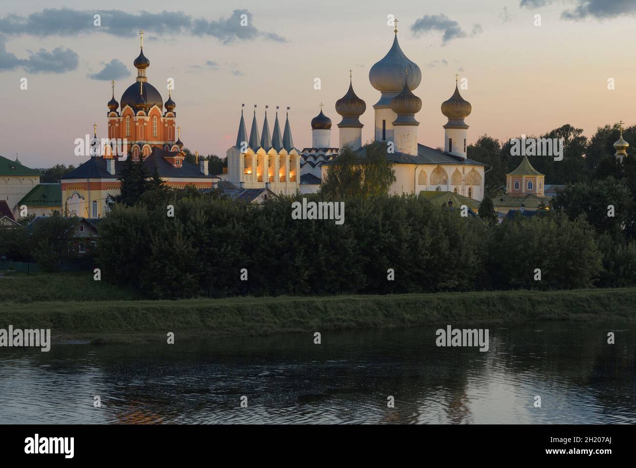 Tikhvin Assumption Monastery in August twilight. Leningrad region, Russia Stock Photo