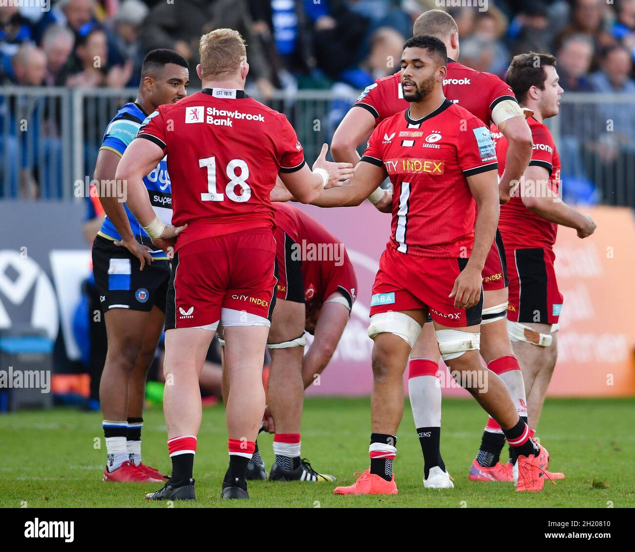 The Recreation Ground, Bath, England, UK. 17th October, 2021. Saracens' Andy Christie shakes hands with Vincent Koch after their 71-17 victory in the Gallagher English Premiership match between Bath Rugby and Saracens: Credit: Ashley Western/Alamy Live News Stock Photo