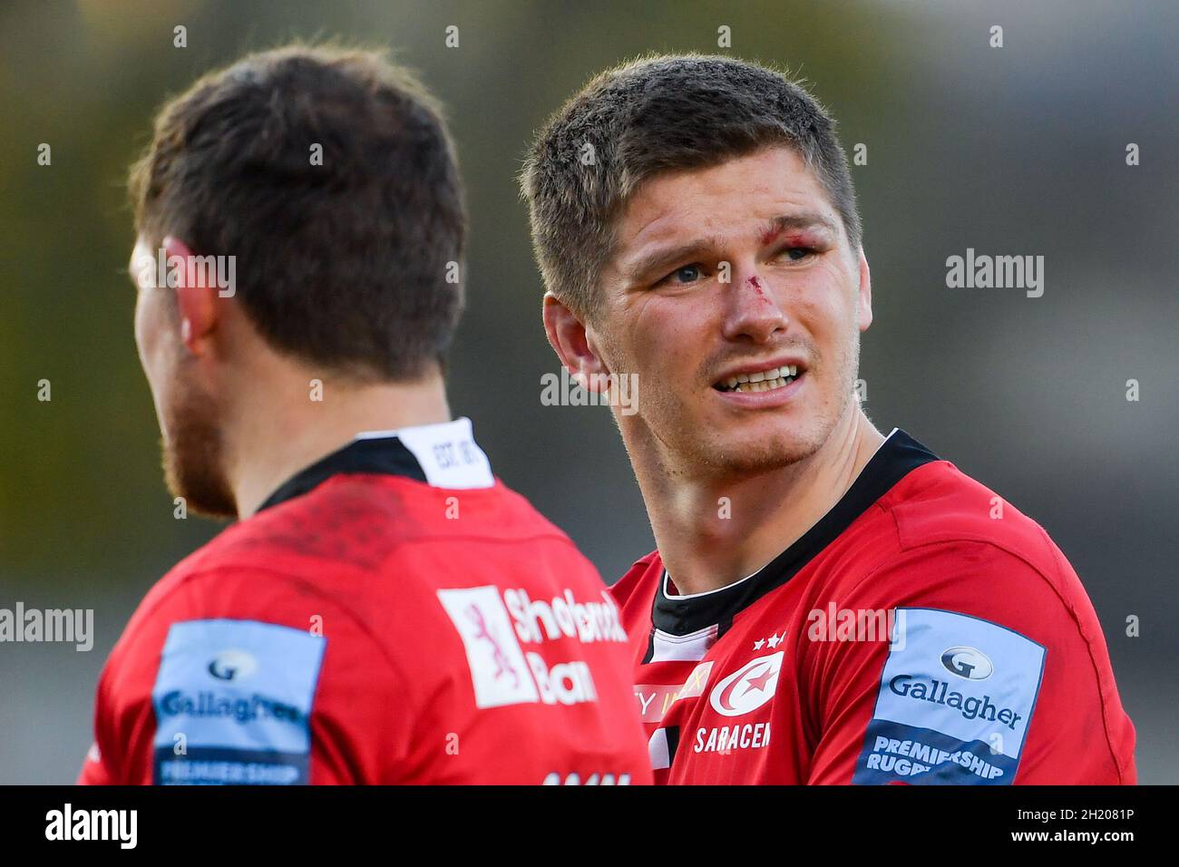 The Recreation Ground, Bath, England, UK. 17th October, 2021. Saracens' Owen Farrell with Alex Goode after the Gallagher English Premiership match between Bath Rugby and Saracens: Credit: Ashley Western/Alamy Live News Stock Photo