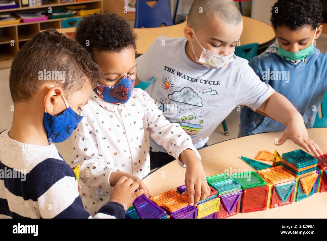 Children playing together ethnic hires stock photography and images
