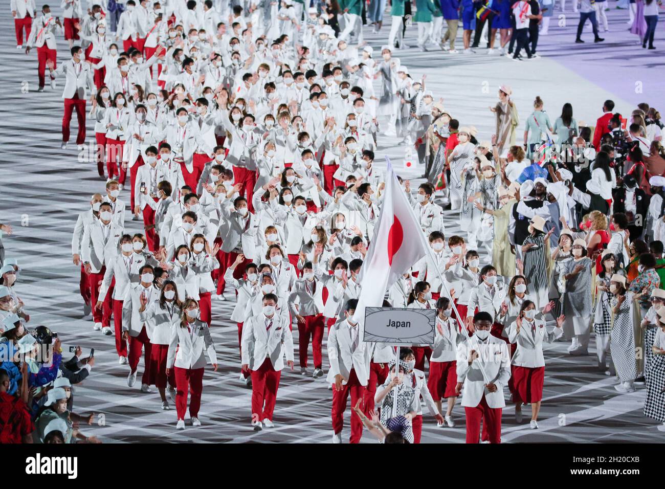 JULY 23rd, 2021 - TOKYO, JAPAN: Japan's flag bearers Yui Susaki and Rui Hachimura enter the Olympic Stadium with their delegation during the Parade of Stock Photo