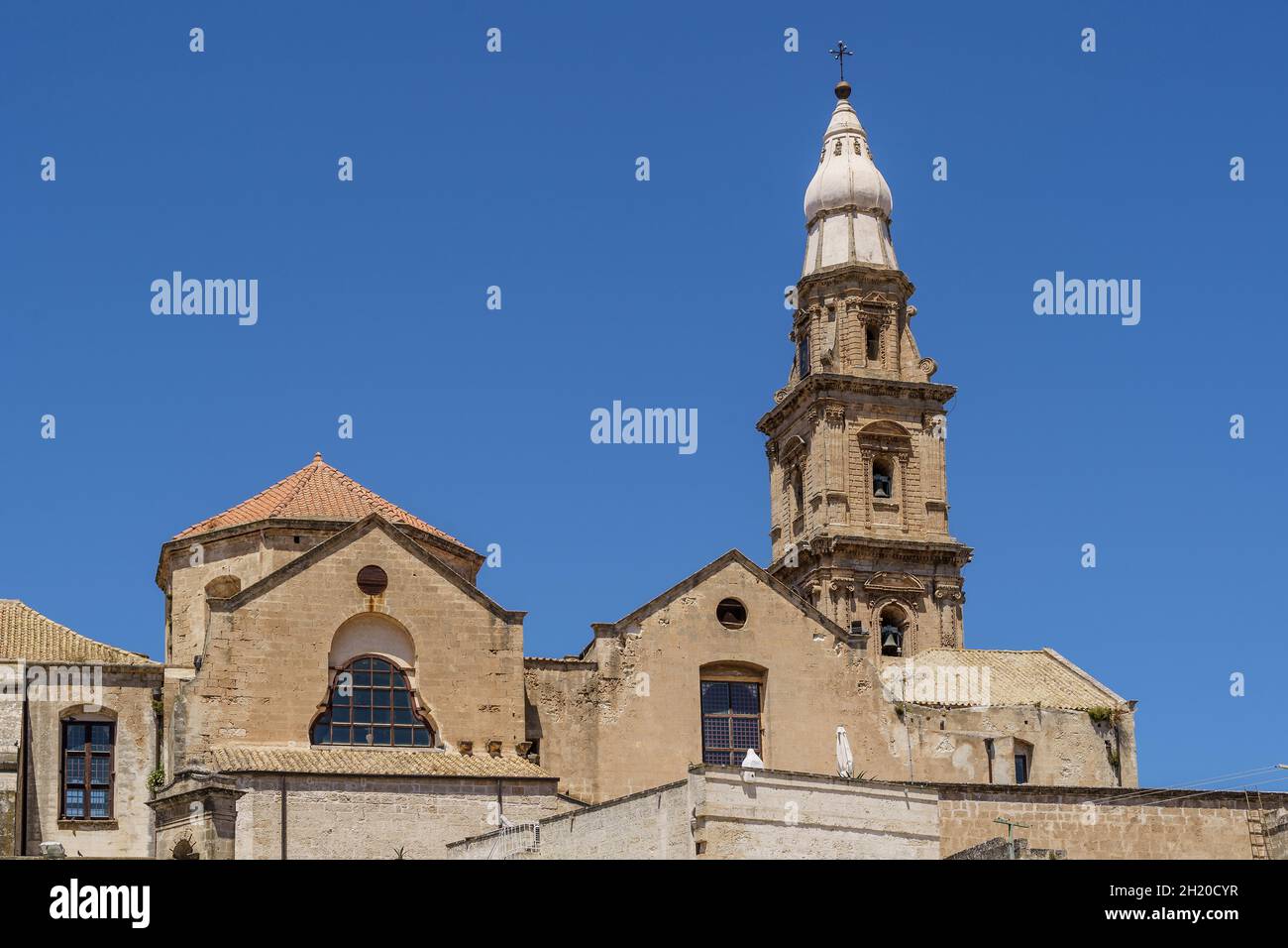 The bell tower of Cathedral Basilica of Maria Santissima della Madia in the historic center of Monopoli, Bari, Puglia, Italy. Stock Photo