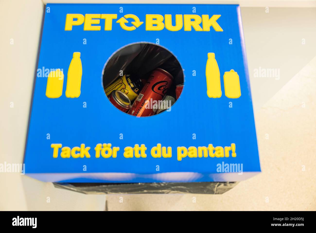 Close up view of container for recycling of metal cans and plastic