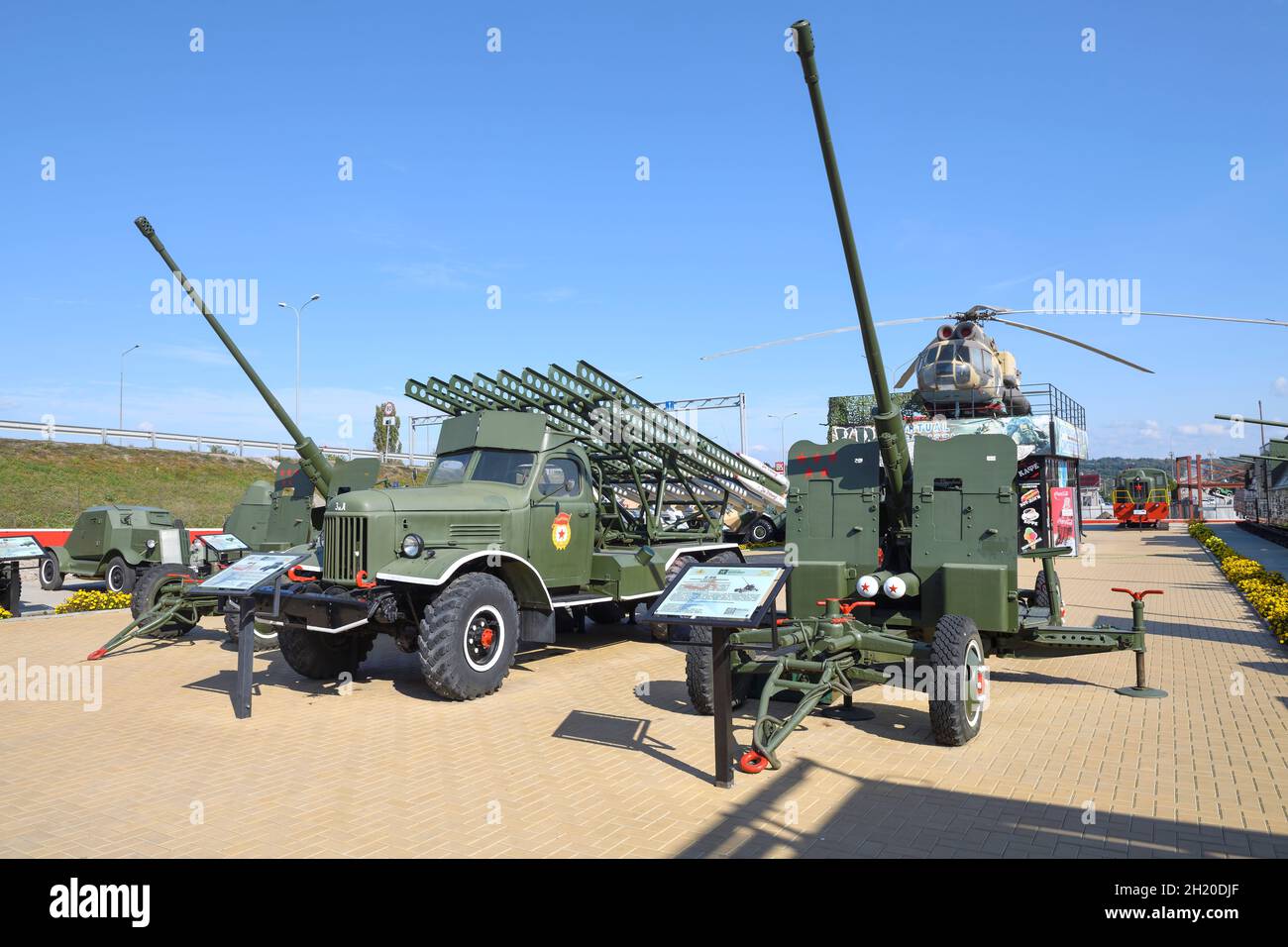 KAMENSK-SHAKHTINSKY, RUSSIA - OCTOBER 04, 2021: Soviet multiple launch rocket system BM-13NM and two anti-aircraft guns S-60 in the exposition of Patr Stock Photo