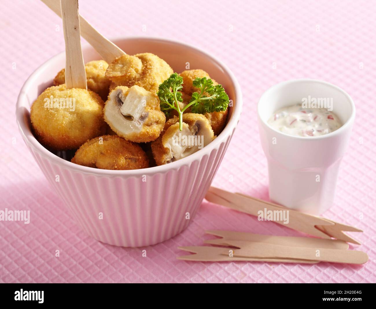 Breaded, crispy fried mushrooms with a vegetable dip made from