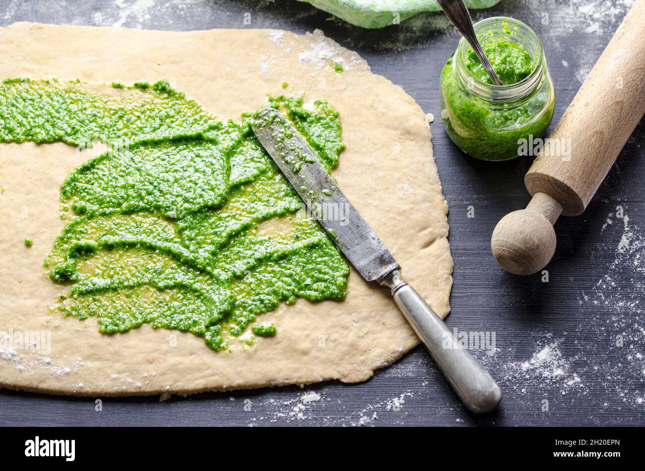 Bread dough with pesto Stock Photo Alamy