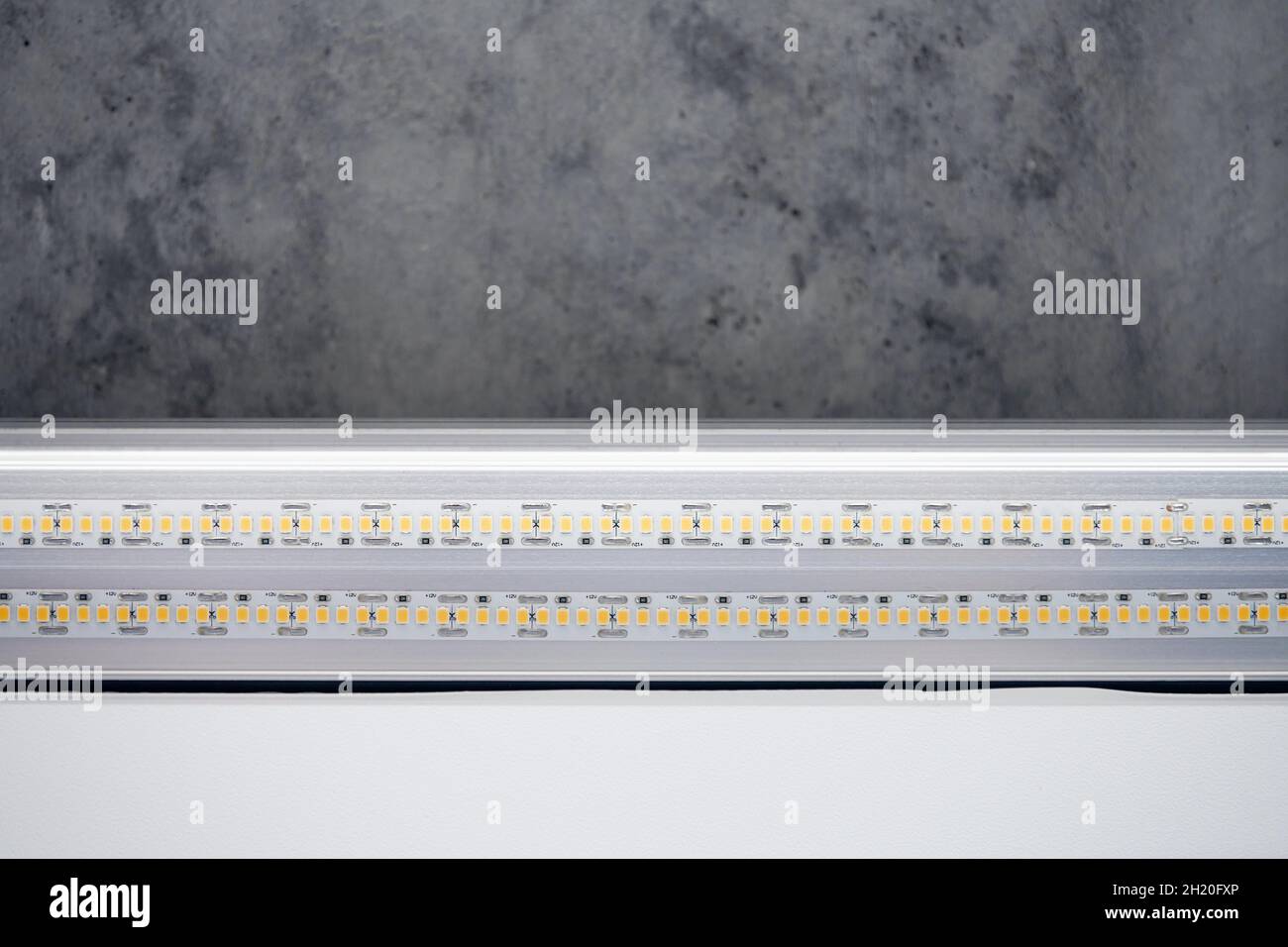 View of Strip LED light with aluminum profile. Stretch ceiling with LED ...