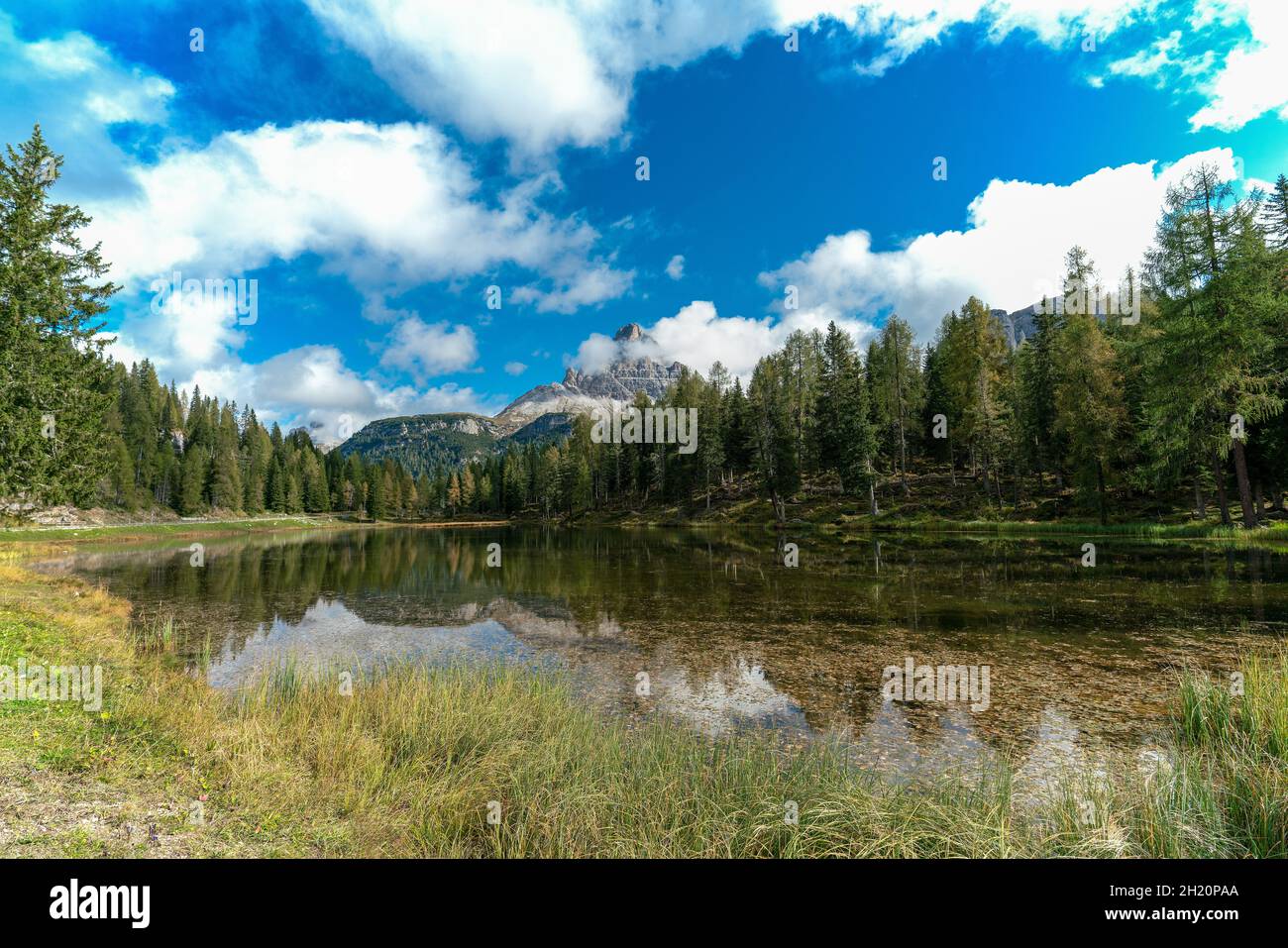 Antorno Lake on a bright autumn day just underneath the famous three peaks in the italian dolomite alps Stock Photo