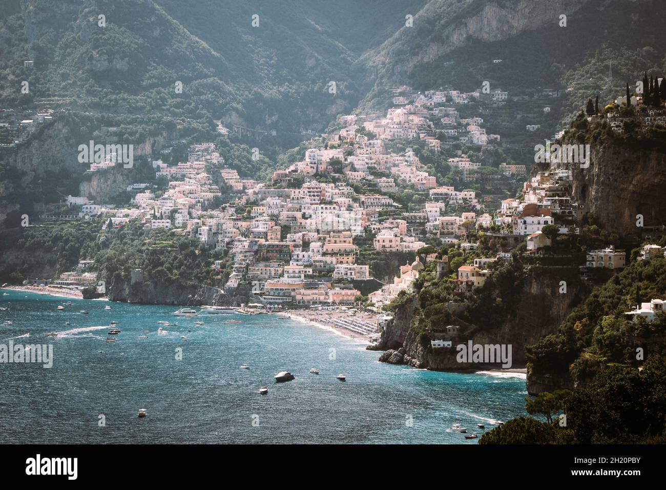 Positano is a village and comune on the Amalfi Coast, in Campania, Italy, mainly in an enclave in the hill leading down to the coast. Stock Photo