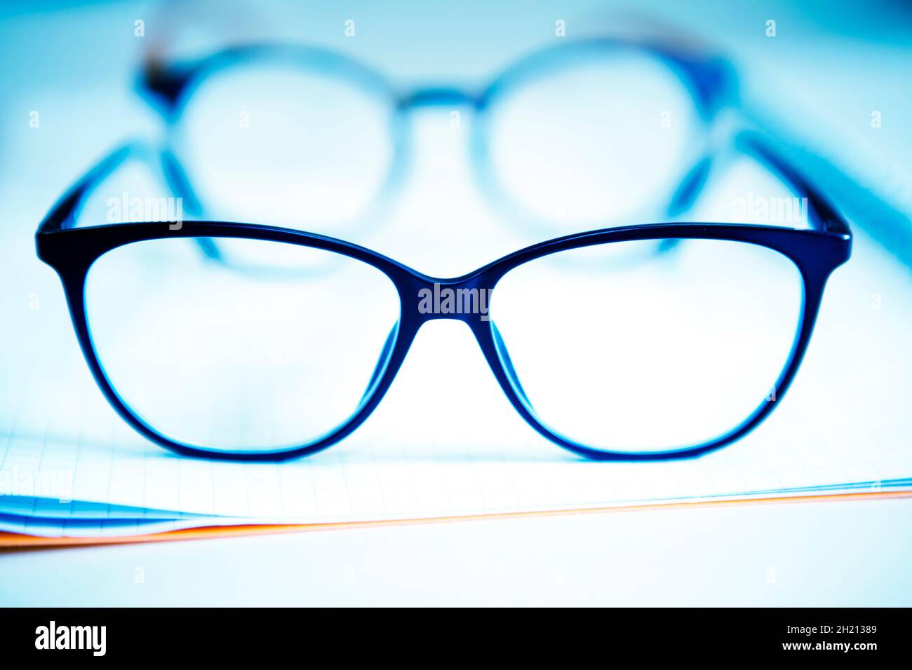 A pair of glasses shown in perspective, highlighting the shape and depth of the frame.