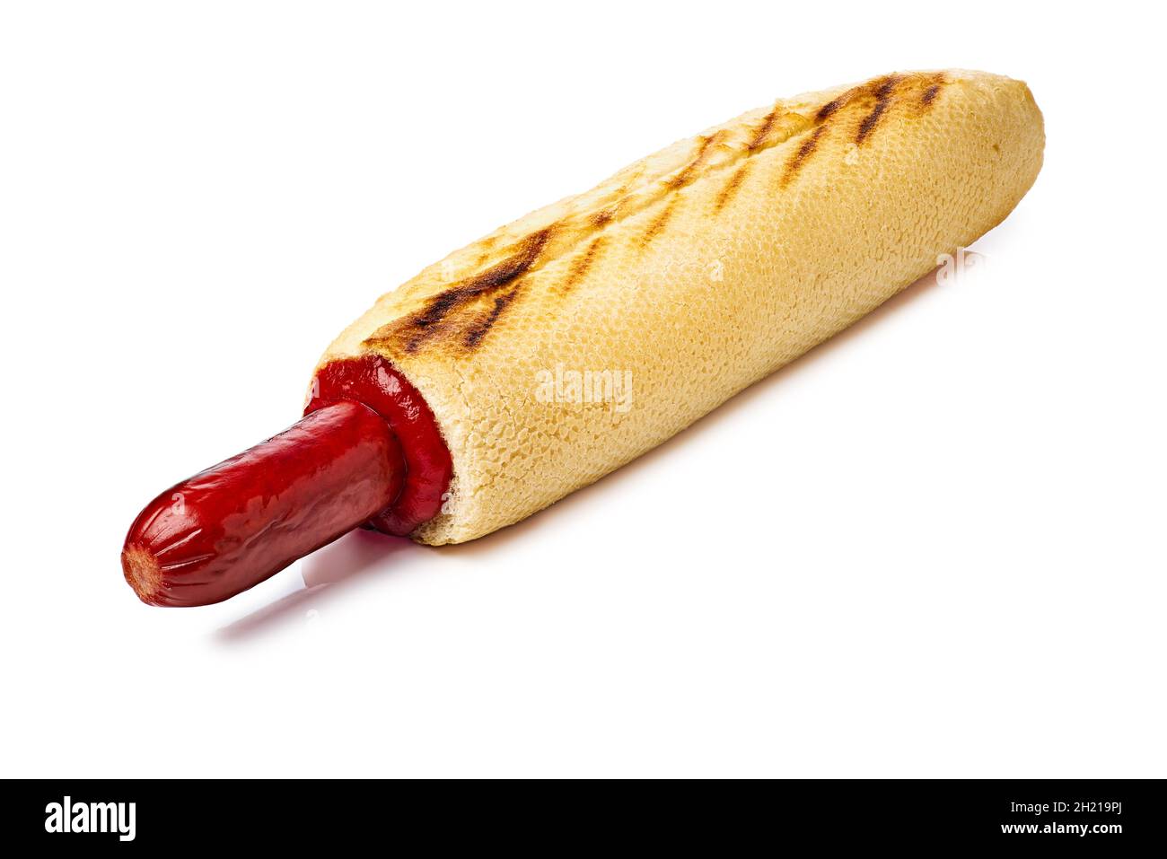 French hot dog with ketchup on white background Stock Photo