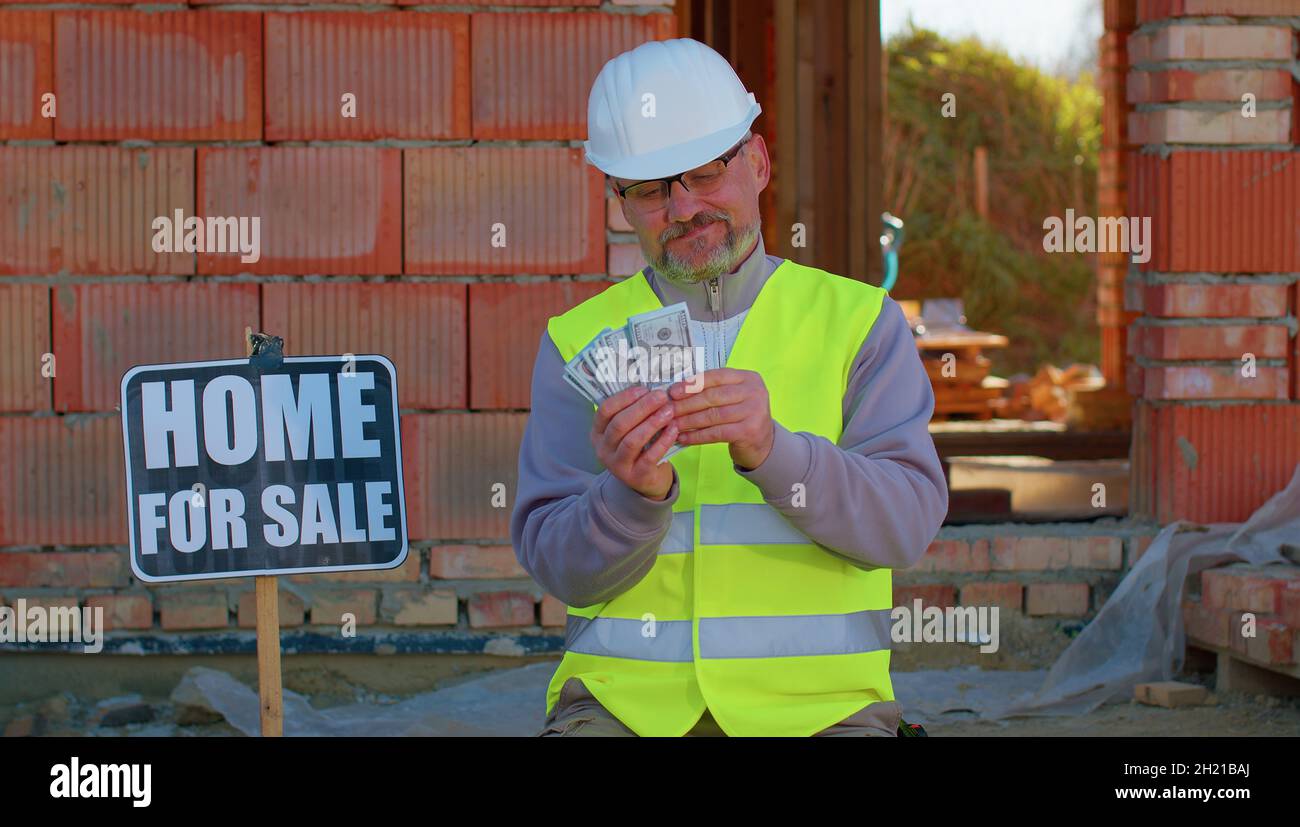 Happy rich realestate agent architect selling new house, service man