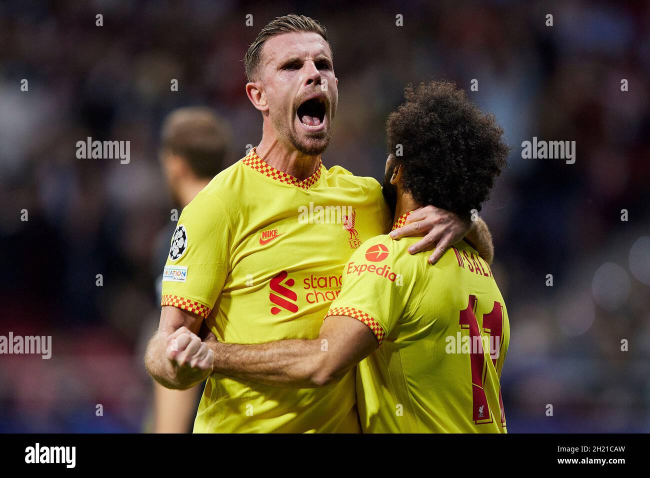 Madrid, Madrid, Spain. 19th Oct, 2021. MOHAMED SALAH and JORDAN HENDERSON  of Liverpool FC celebrating during the Champions League football match  between Atletico de Madrid and Liverpool FC at Wanda Metropolitano Stadium