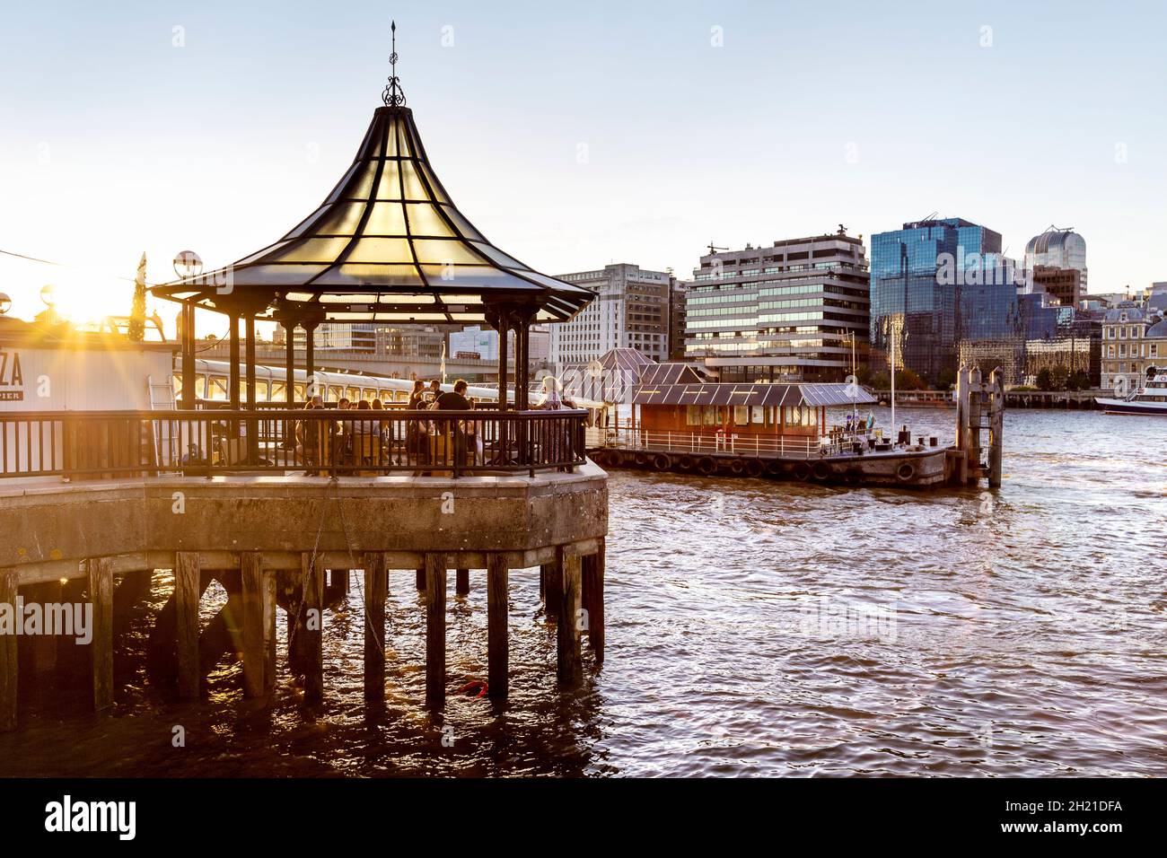Pagoda overlooking the Thames River at Piazza by the Pier restaurant, London Bridge, London, UK Stock Photo