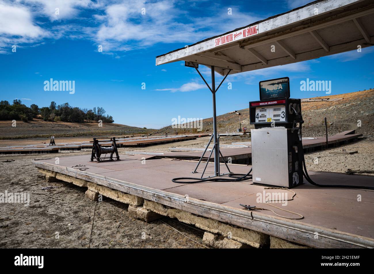 A gas pump sits on a dock at an empty Brown's Ravine marina. Water