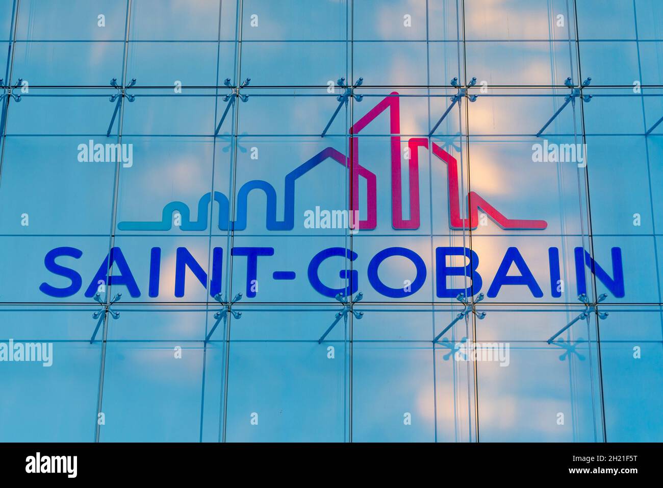 Logo on the tower housing the headquarters of Saint-Gobain, French company specializing in the production, processing and distribution of materials Stock Photo