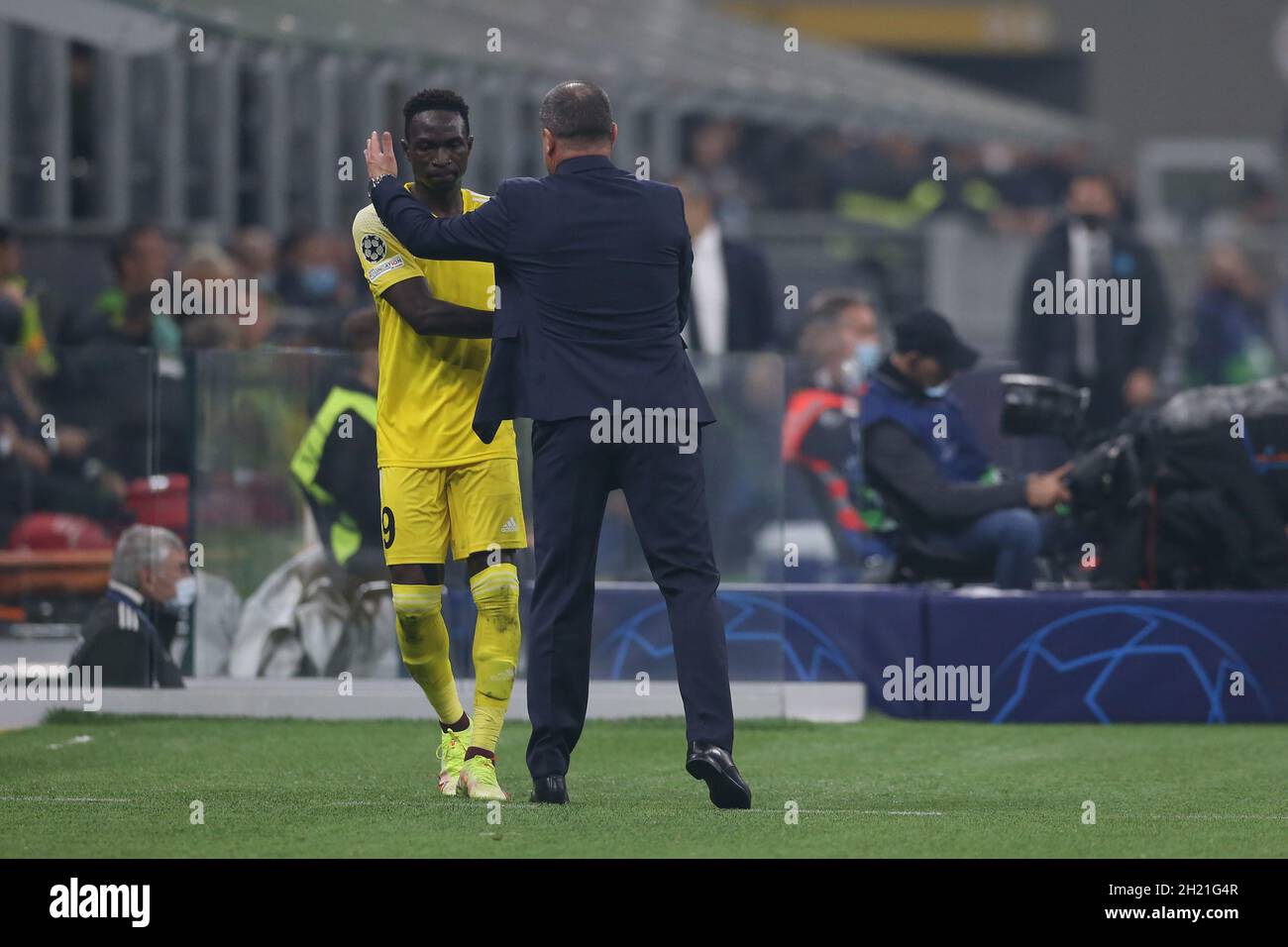Milan, Italy, 19th October 2021. Yuriy Vernydub Head coach of Sheriff Tiraspol compliments Adama Traore of Sheriff Tiraspol as her is substituted during the UEFA Champions League match at Giuseppe Meazza, Milan. Picture credit should read: Jonathan Moscrop / Sportimage Stock Photo