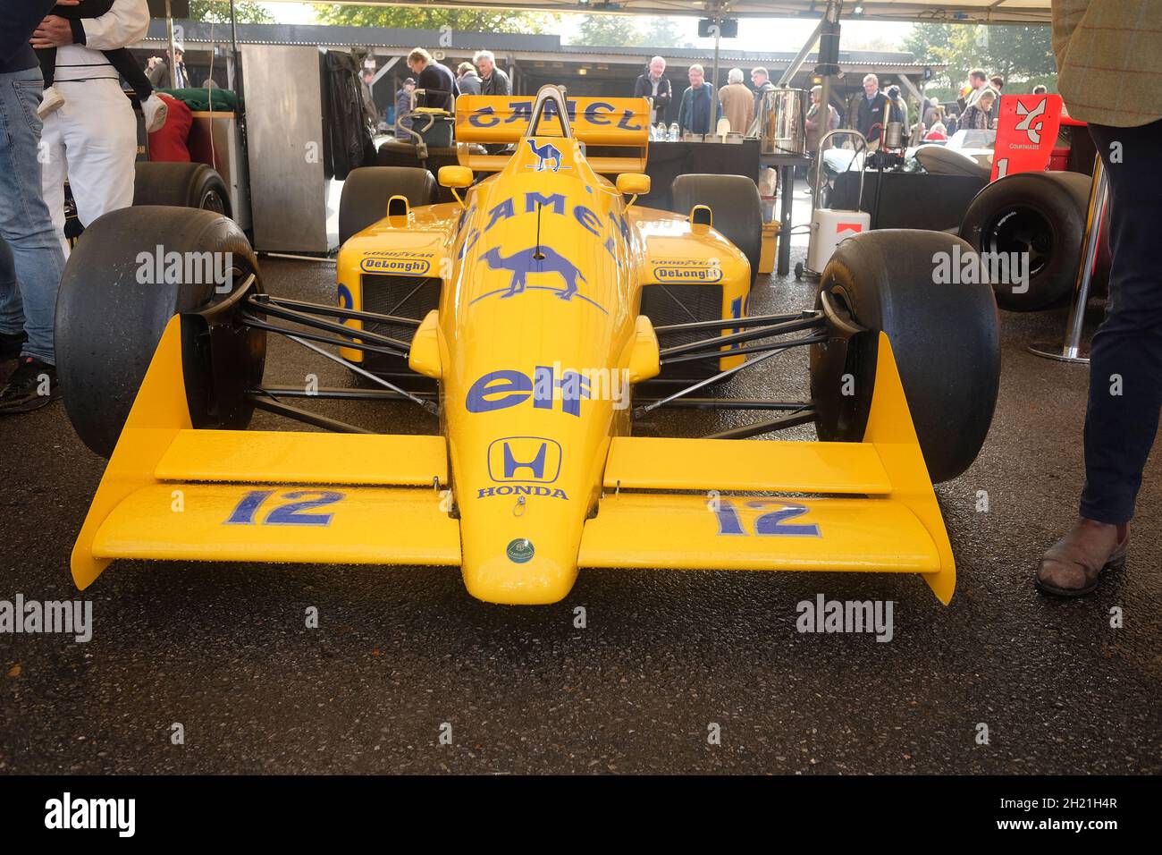 October 2021 - Yellow camel lotus powered by Honda at the covid delayed Goodwood Members Meeting 78. Stock Photo