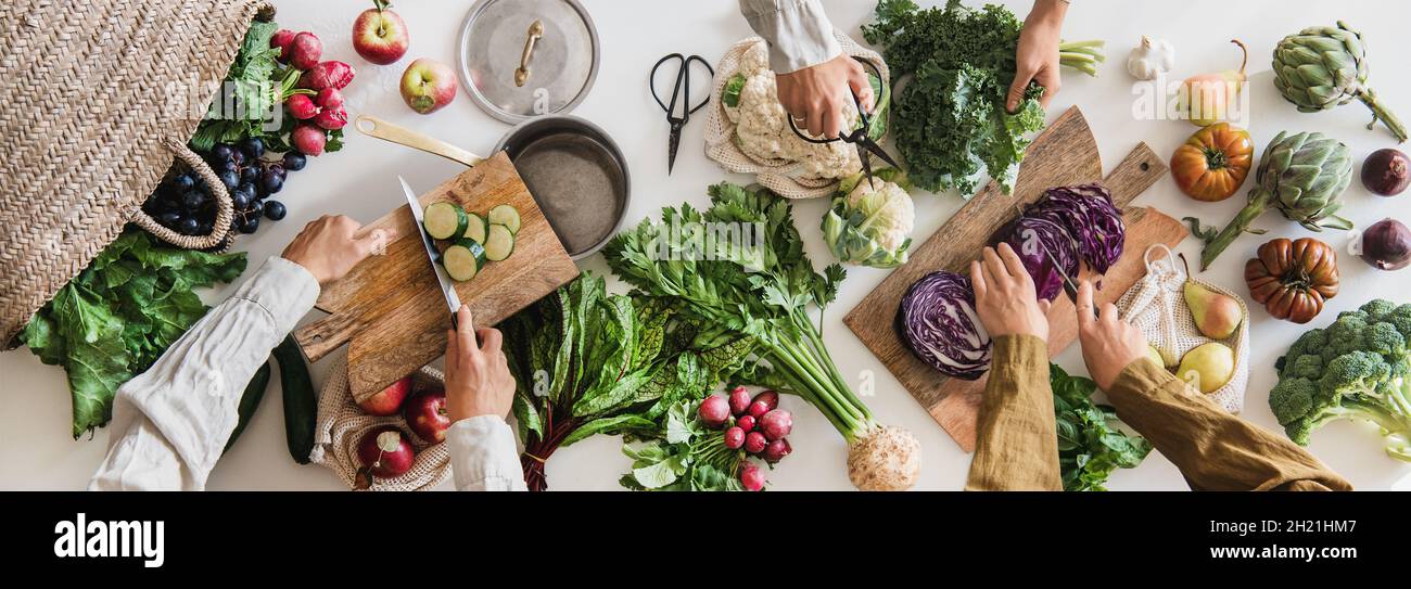 Fall vegetable vegetarian cooking background with greens and fruits Stock Photo