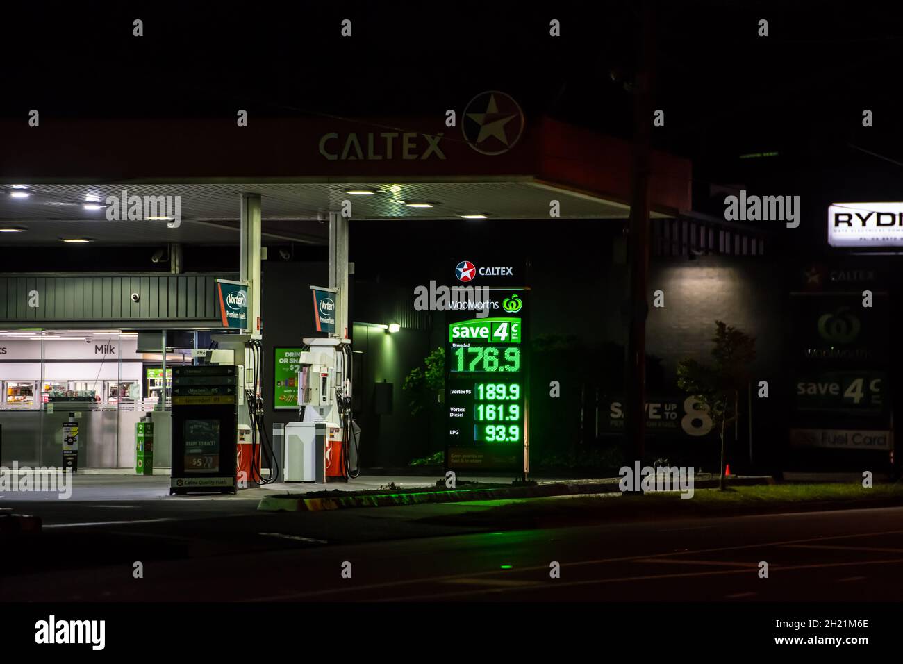 Melbourne, Australia. 20th Oct, 2021. Caltex petrol station in Australia at night with a price