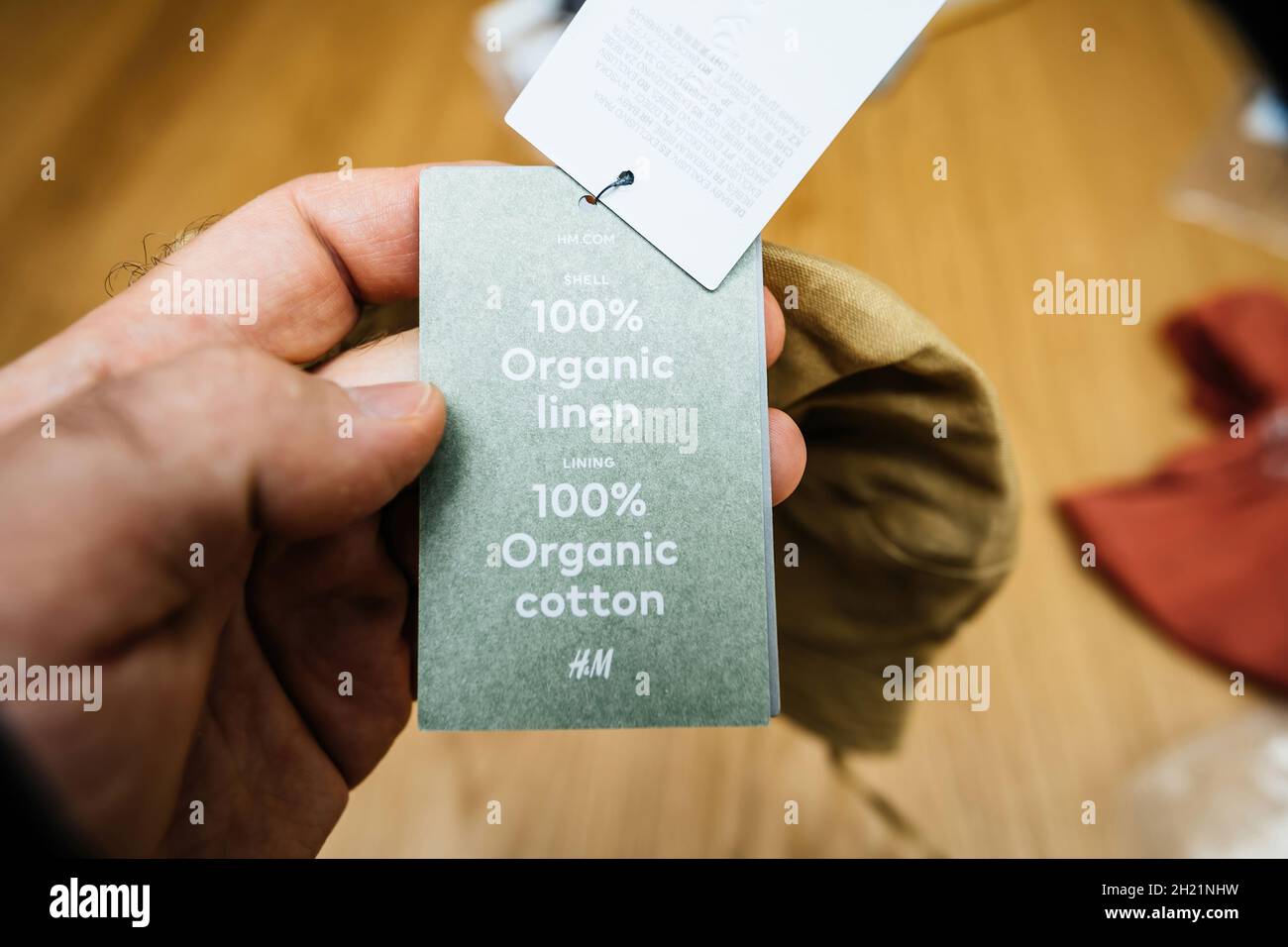 premium selection organic 100 percent sign manufactured by the H and M  Hennes and Mauritz AB Stock Photo - Alamy