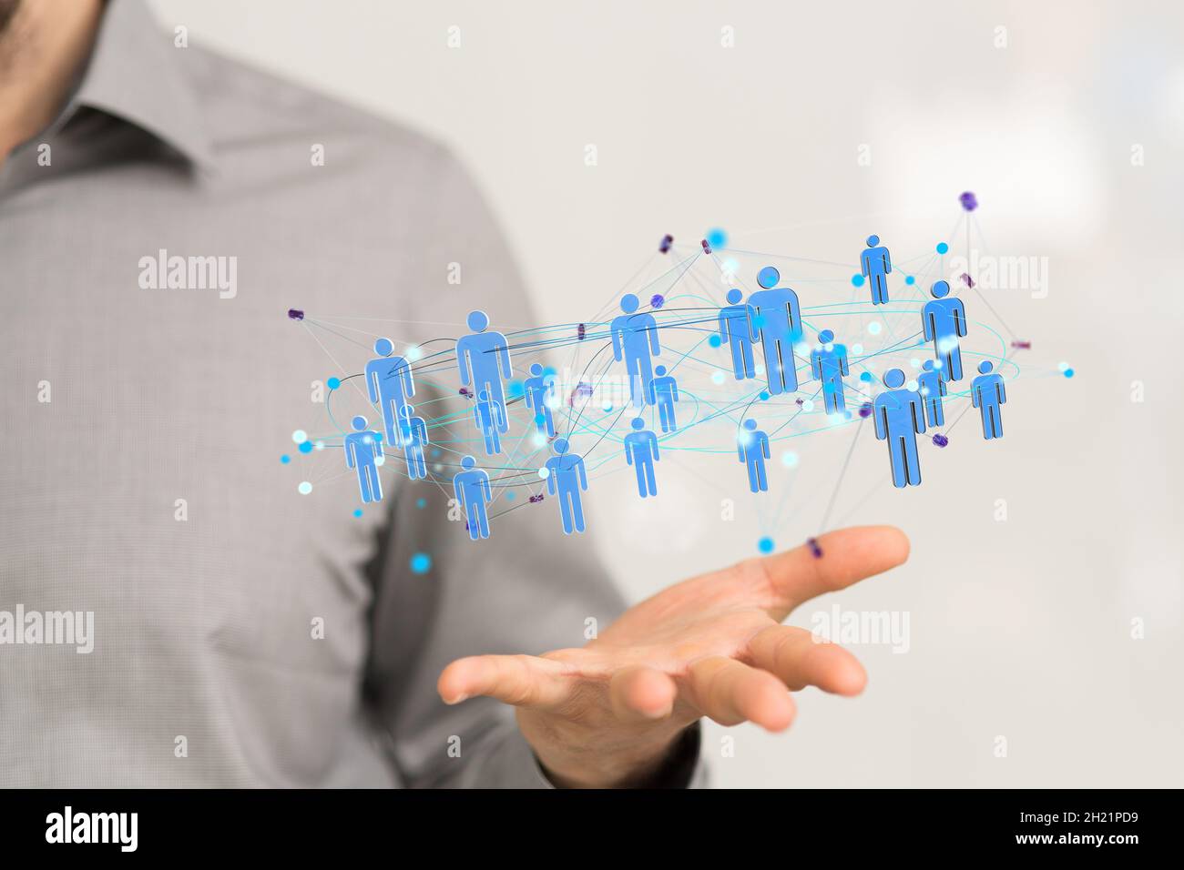 3D rendered people icons hovering over the person's hand Stock Photo ...