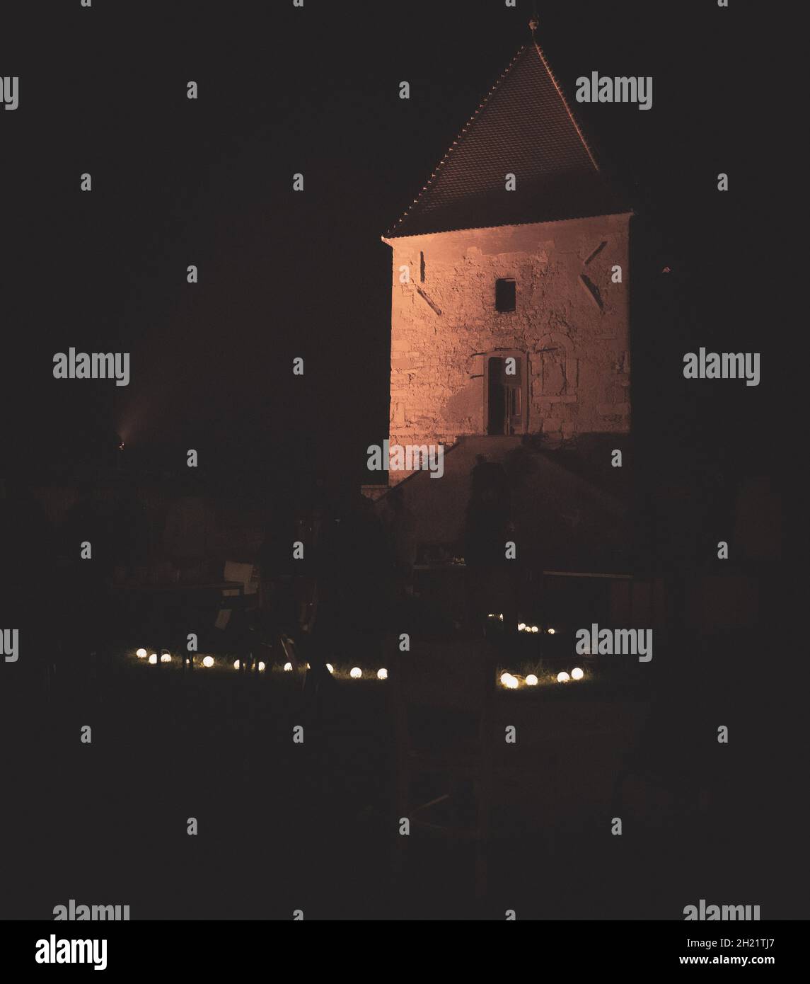Vertical shot of a tower at night Stock Photo - Alamy