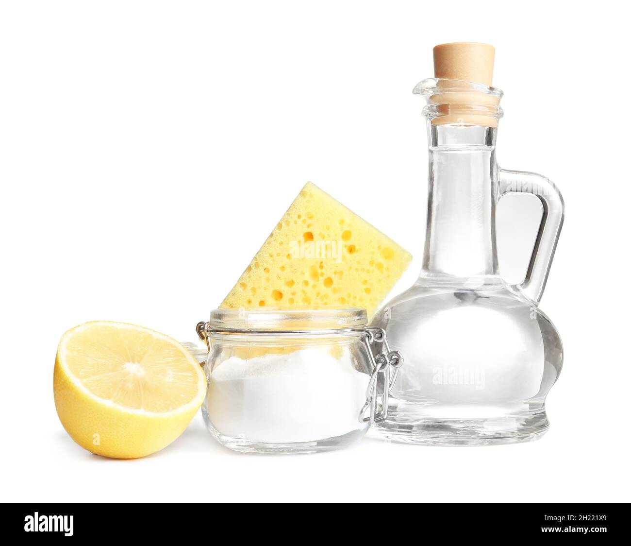 Composition with vinegar, lemon and baking soda on white background