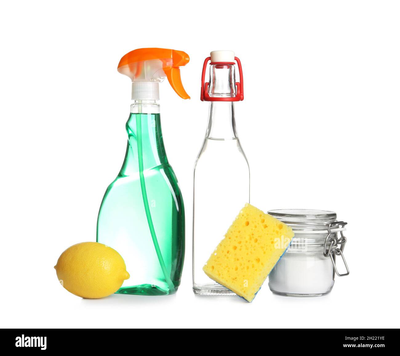 Composition with vinegar, lemon and baking soda on white background