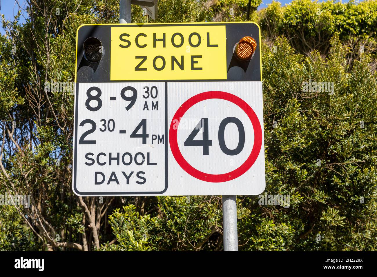 School zone speed limit sign of 40km/hour during school start and finish times in Sydney,NSW,Australia Stock Photo