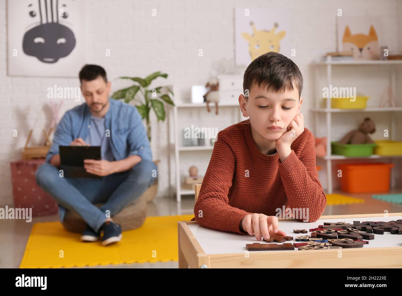 Little boy with autism spectrum disorder at psychologist's office Stock Photo Alamy