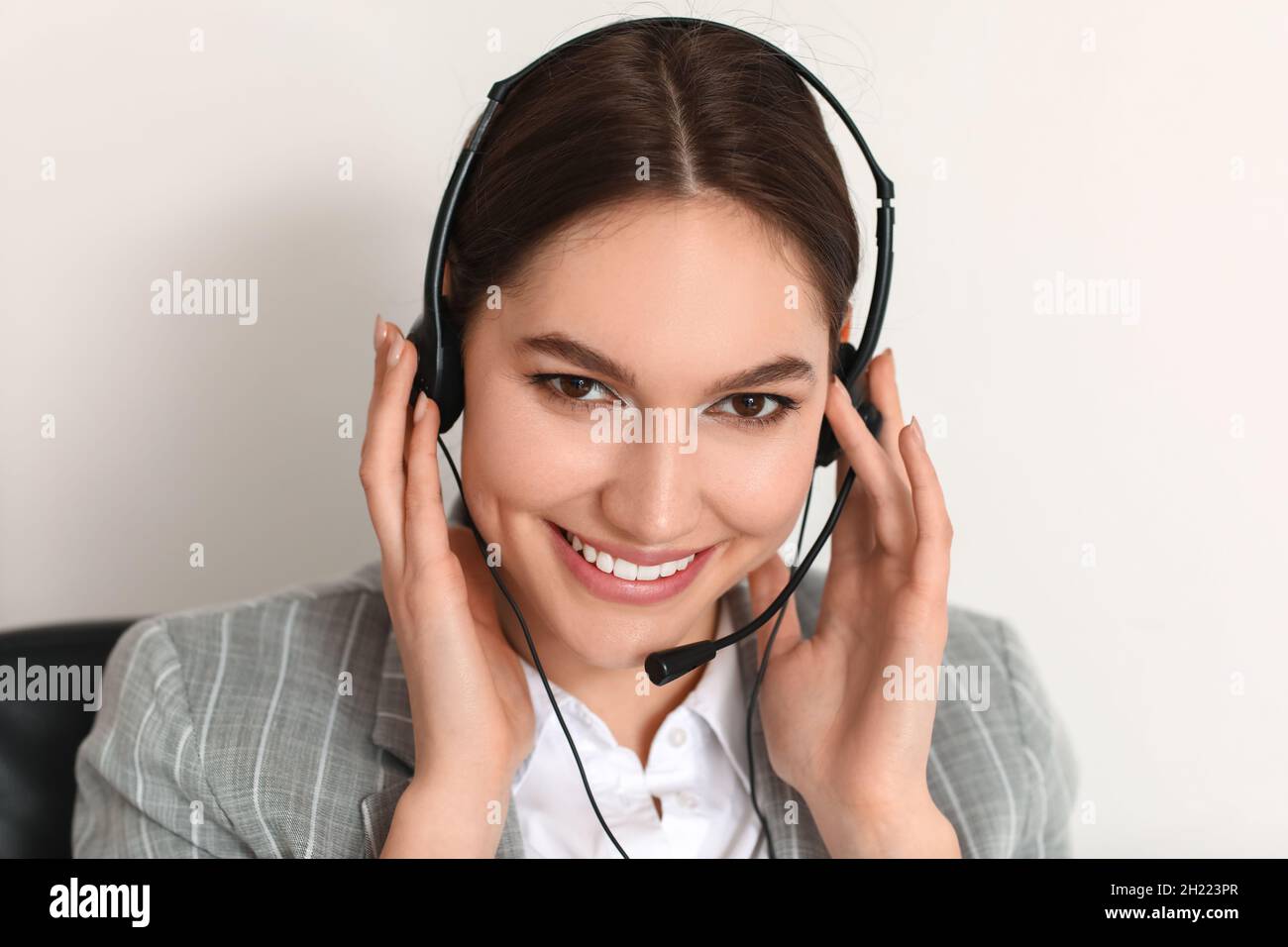 Technical support agent working in office Stock Photo - Alamy