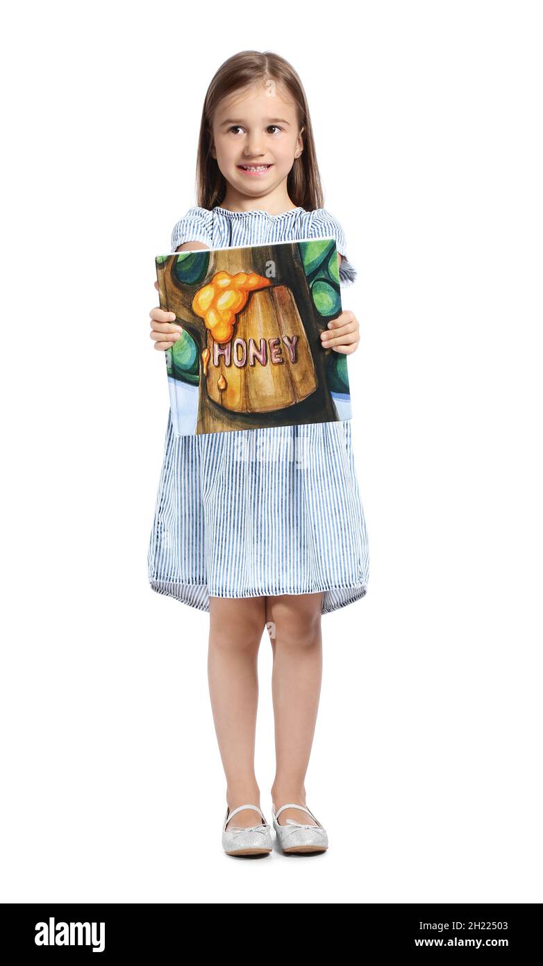 Cute little girl holding book on white background Stock Photo - Alamy