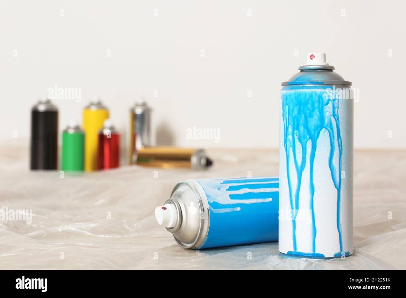 Used cans of spray paint indoors. Space for text Stock Photo Alamy