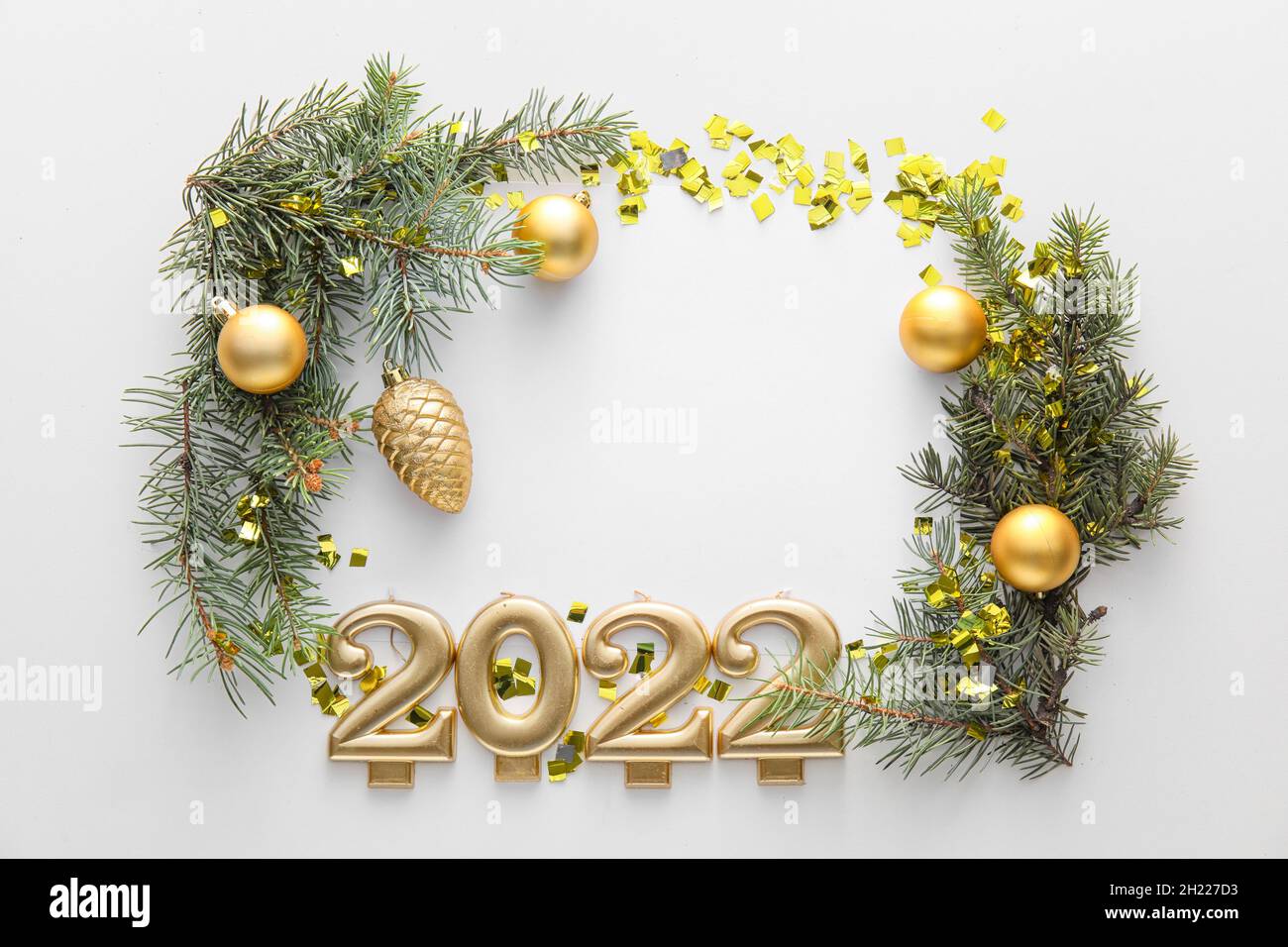2022 Fram Ornament Christmas Frame Made Of Fir Branches, Christmas Decorations And Figure 2022 On White  Background Stock Photo - Alamy