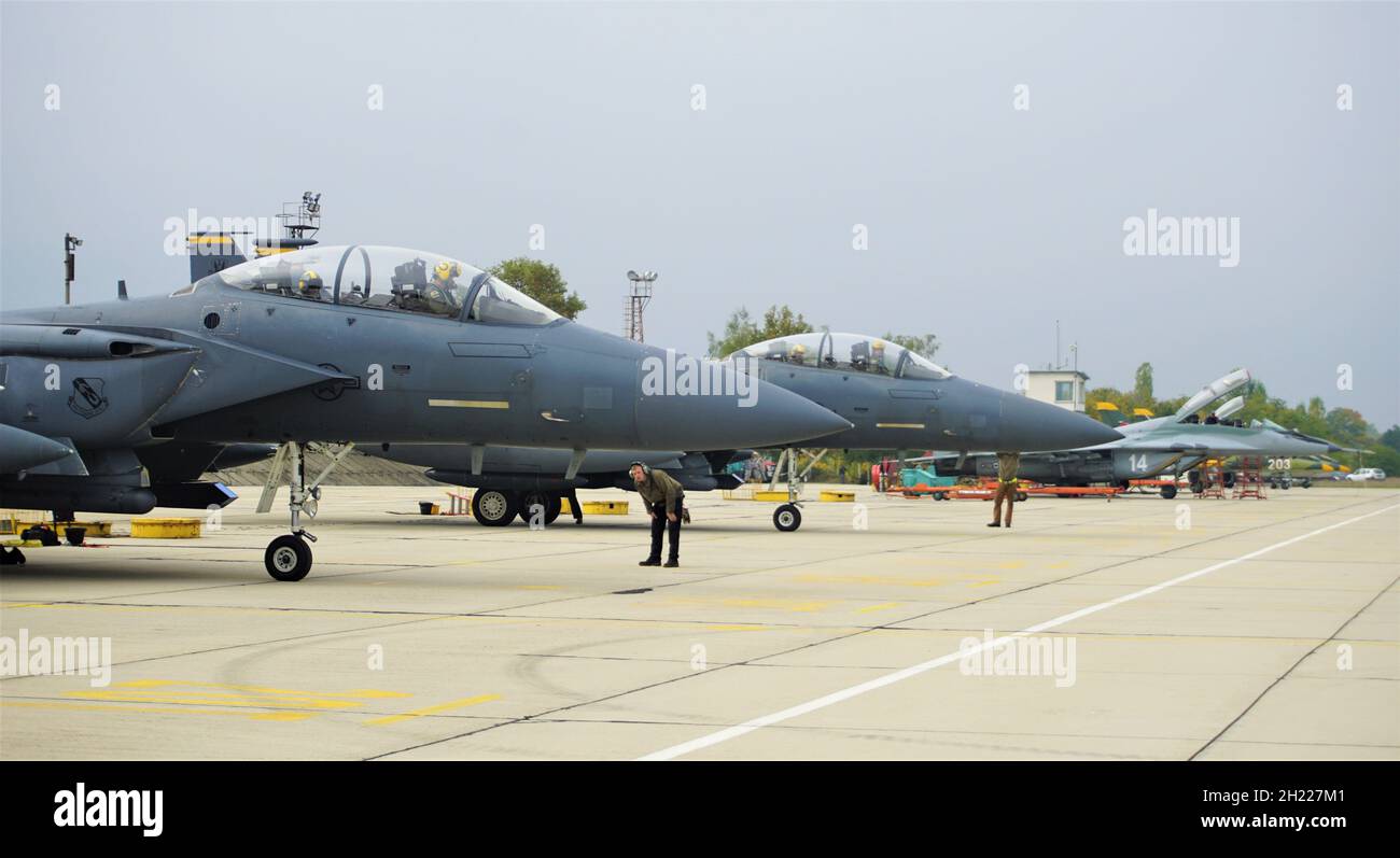 U.S. F-15E Strike Eagle aircraft from the 336th Fighter Squadron, 4th Fighter Wing, Seymour Johnson Air Force Base, North Carolina, arrive at Graf Ignatievo Air Base, Bulgaria, Oct. 18, 2021, in support of operation Castle Forge, a U.S. Air Forces Europe-Air Forces Africa-led joint, multinational training event. The Strike Eagles will spend the next several days training alongside Bulgarian Air Force MiG-29 aircraft, continuing Castle Forge’s objective of affirming U.S. commitment to NATO allies in the Black Sea region (Courtesy photo). Stock Photo