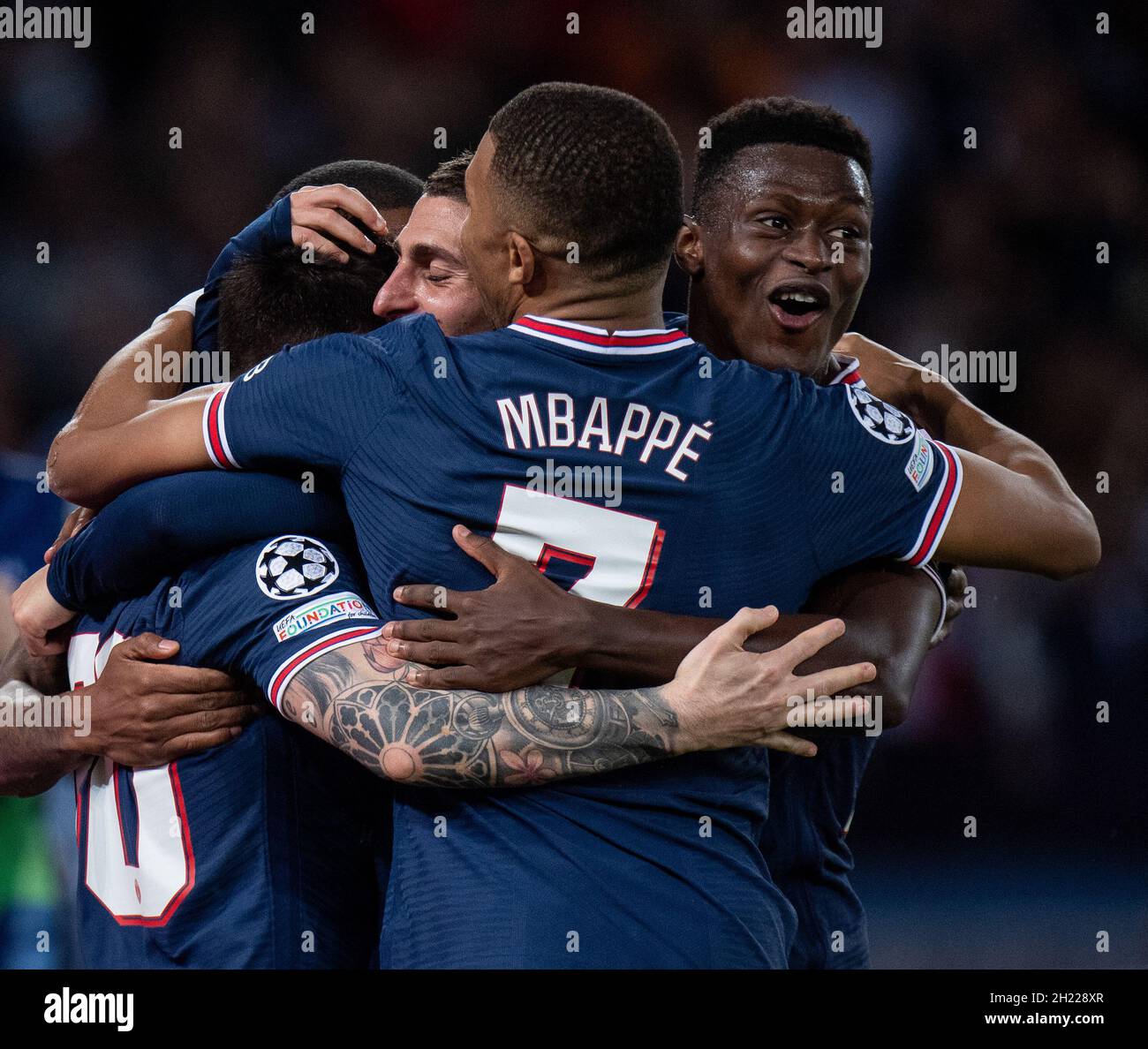 PARIS, FRANCE - OCTOBER 19 Lionel Messi of Paris Saint-Germain celebrate with Kylian Mbappé and Danilo after scoring hes 2nd goal during the UEFA C Stock Photo