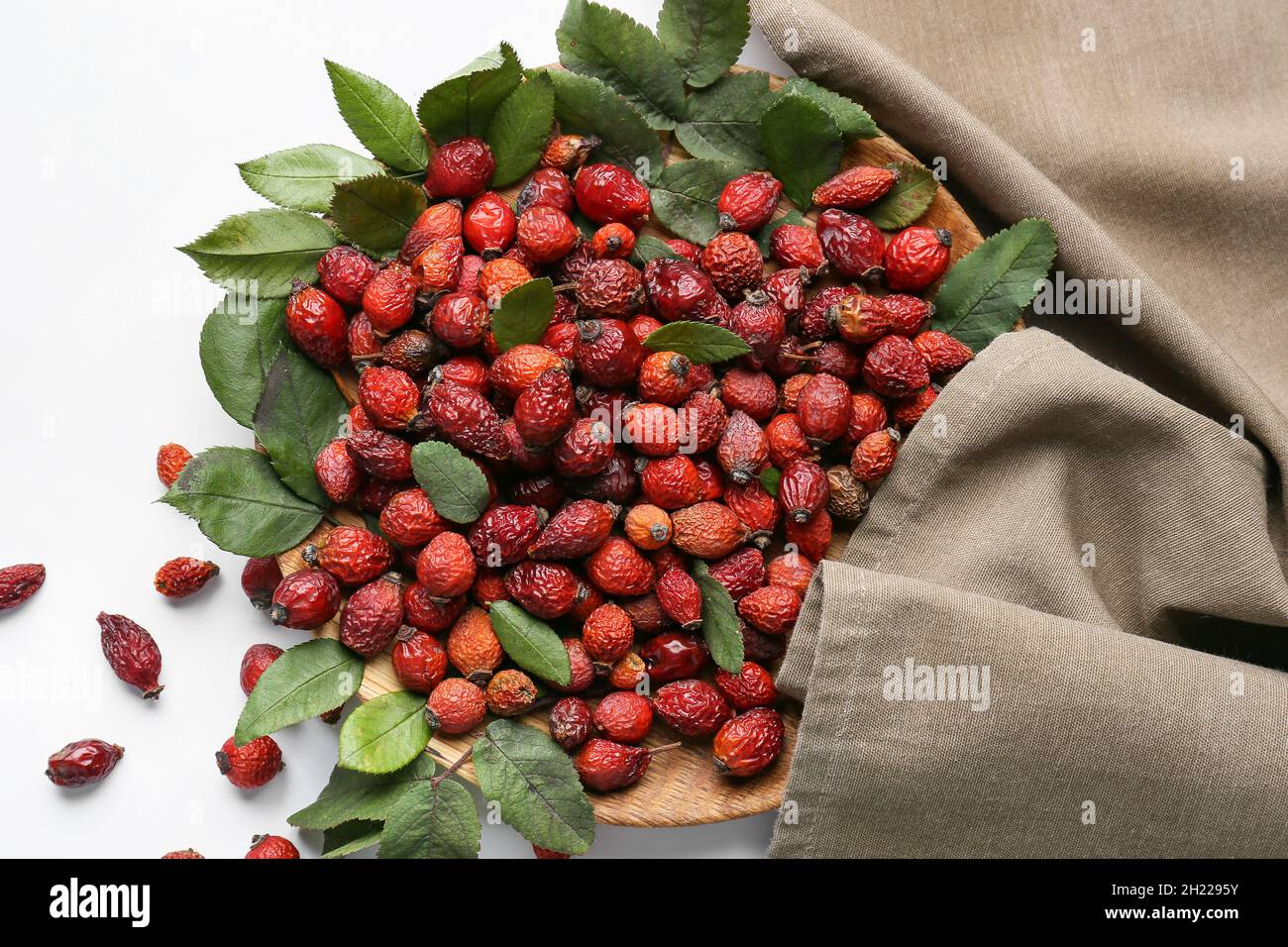 Dried rose hip berries on white background Stock Photo Alamy