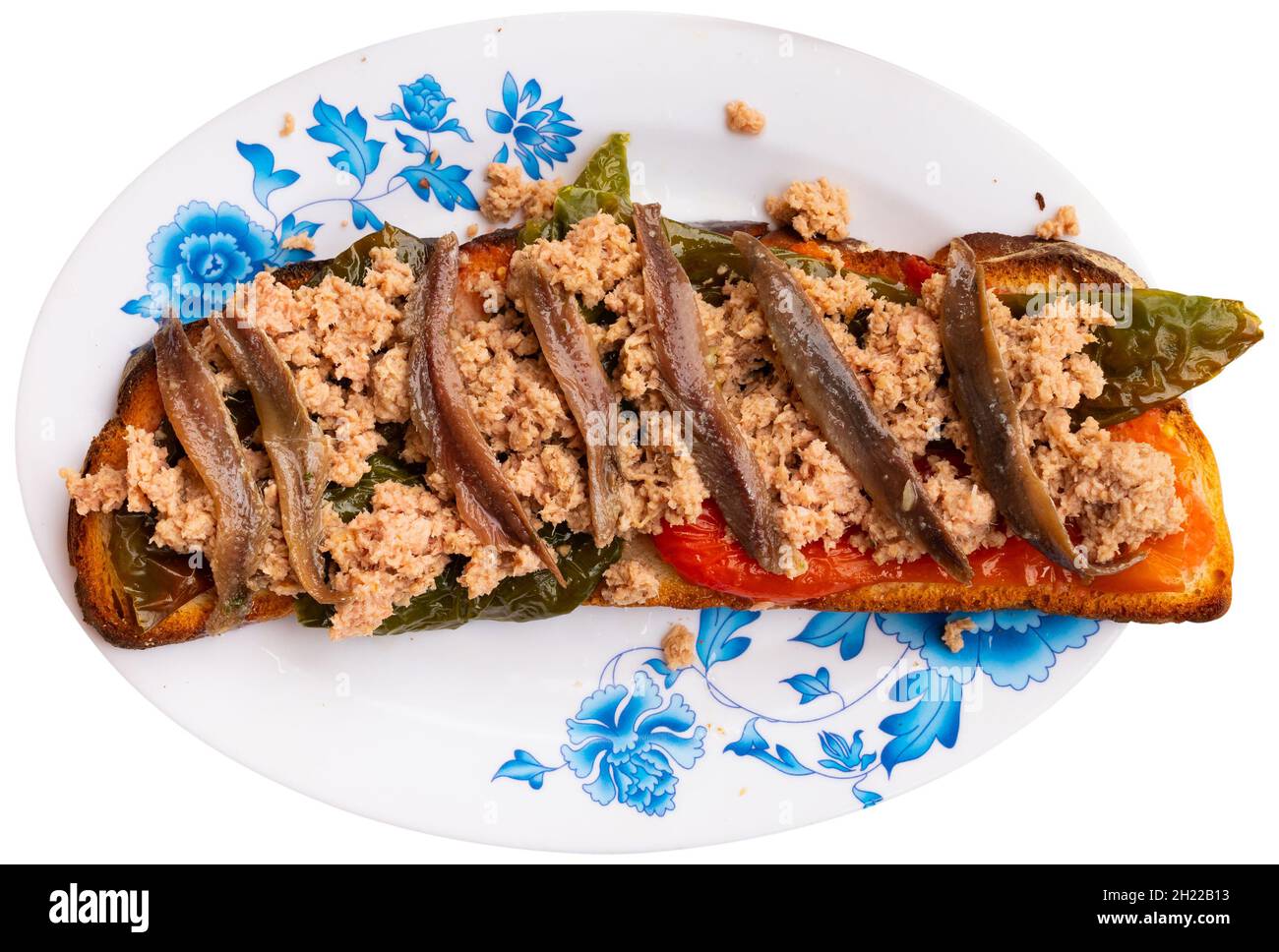 Toasted bread with chopped tuna, anchovies and baked bell pepper Stock Photo Alamy