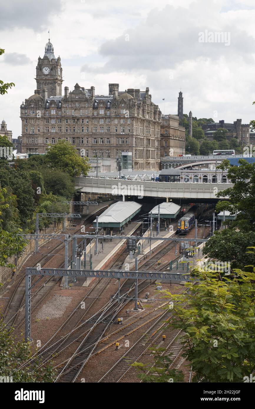 Aerial shot of the Edinburgh Waverley railway station on a cloudy day, in the UK Stock Photo