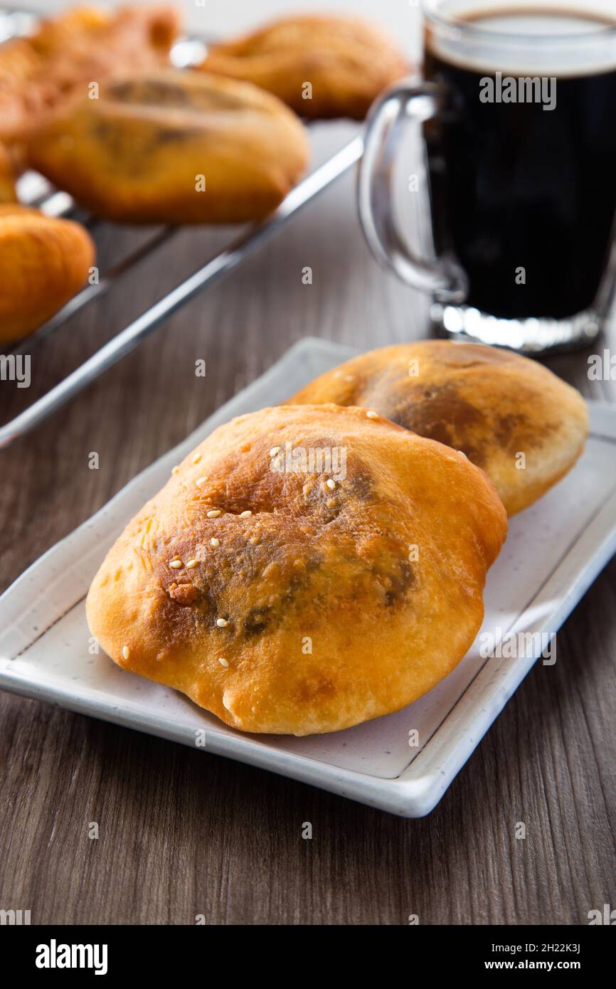 Ham chim peng. (deep-fried chinese doughnut). There are at least 3 varieties of ham chin peng - with glutinous rice, five spice powder and red bean pa Stock Photo