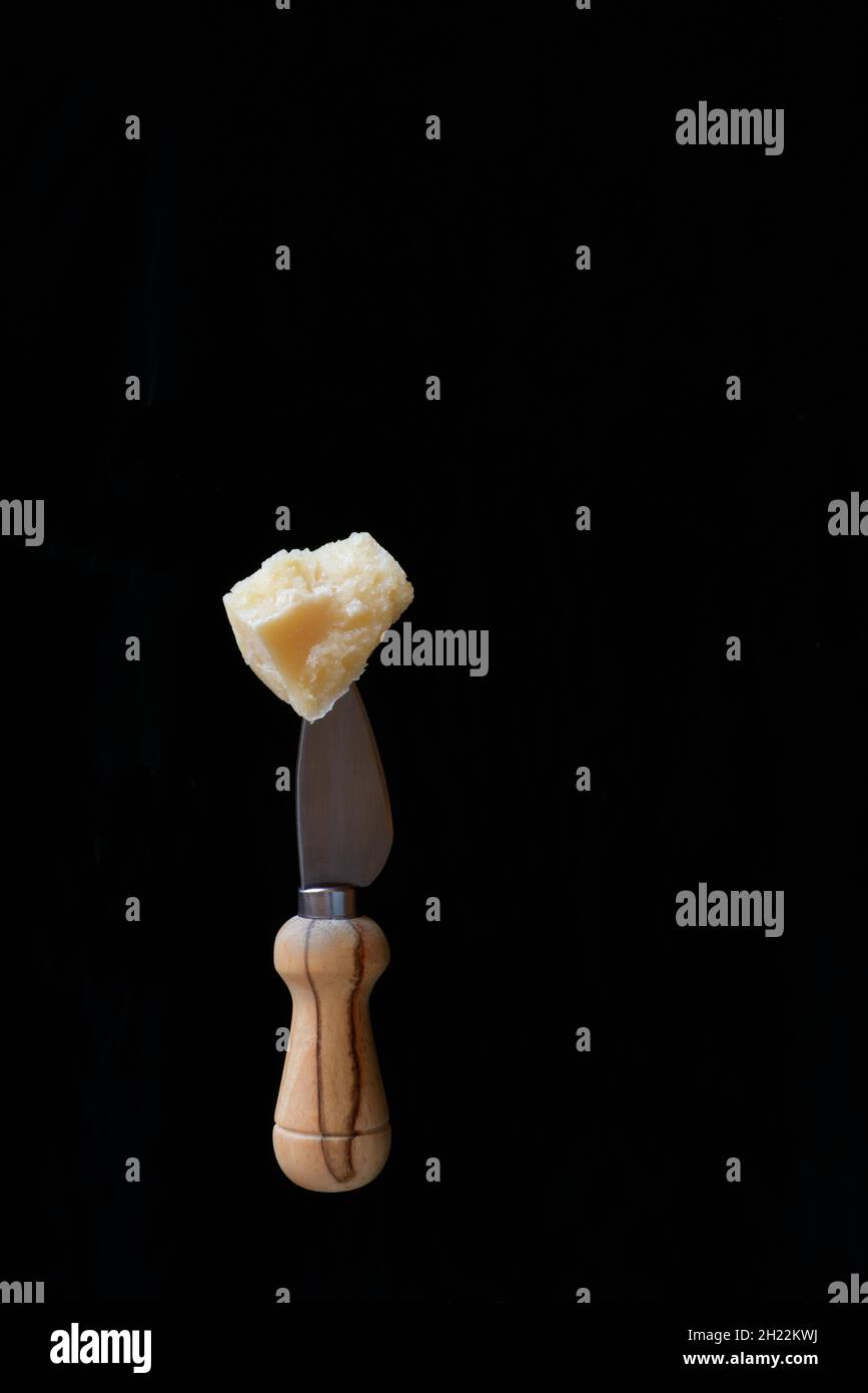 Parmesan cheese on cheese knife, Germany Stock Photo Alamy