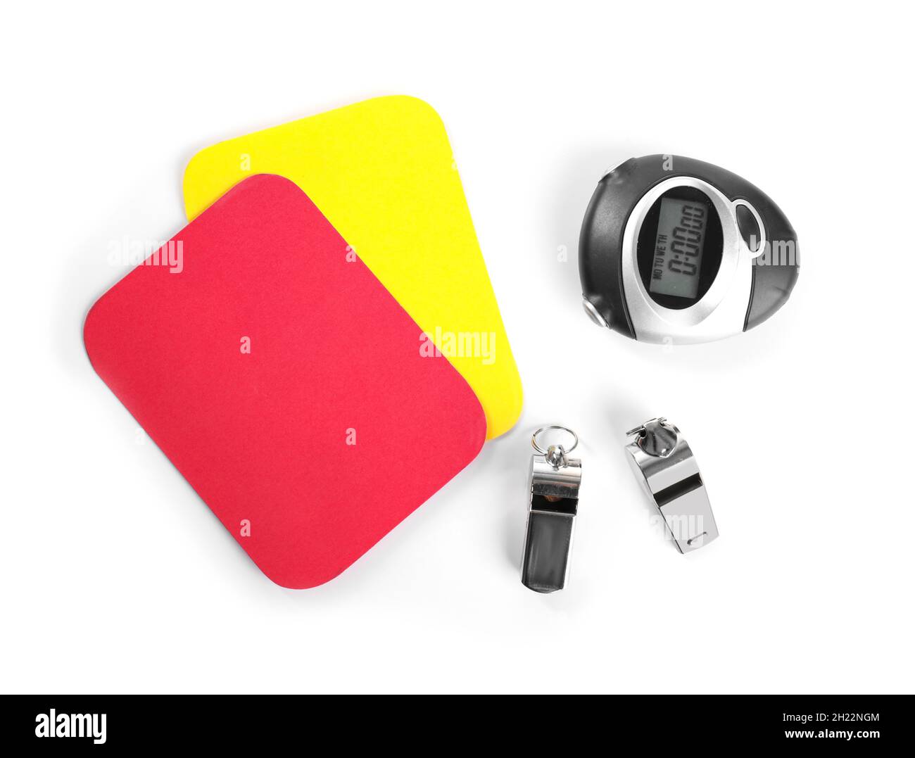 Whistles, stopwatch, red and yellow cards on white background, top view