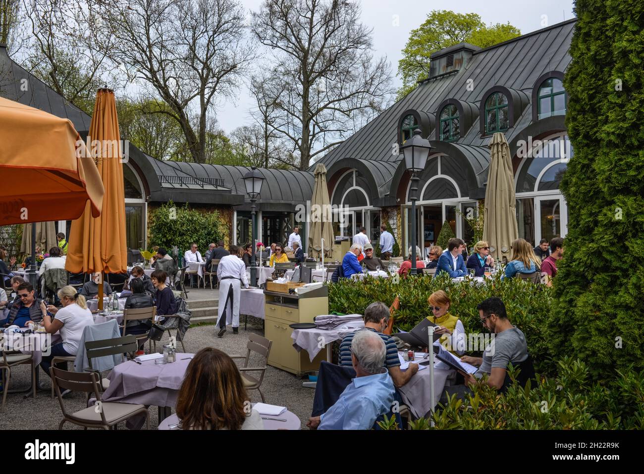 Seehaus beer garden at Kleinhesseloher See, English Garden, Munich, Bavaria, Germany Stock Photo