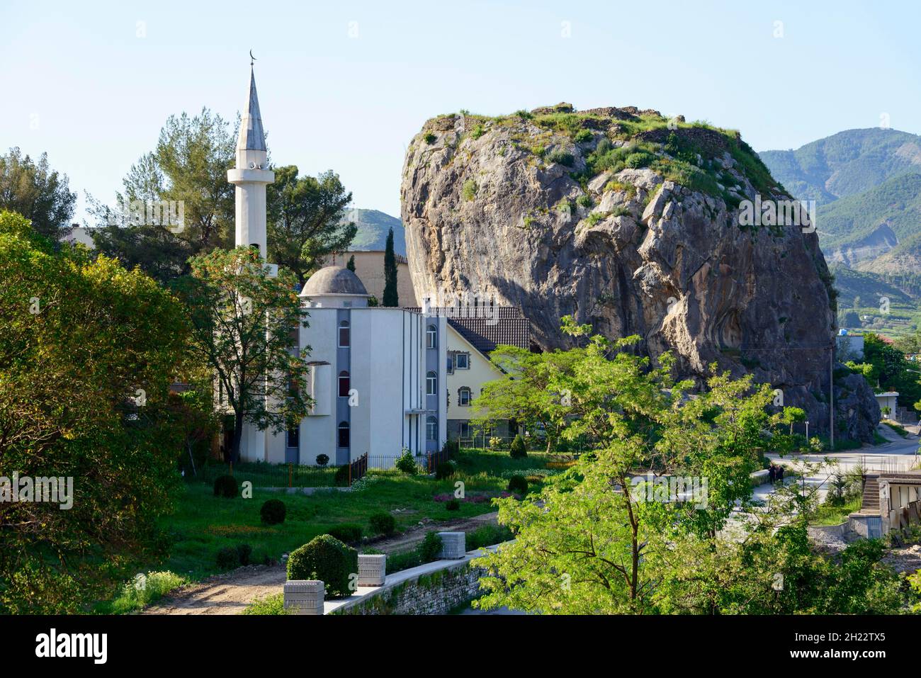 Mosque and landmark Solitaire Rock, River Vjosa, Permet, Permet, Solitaire Rock, Albania Stock Photo