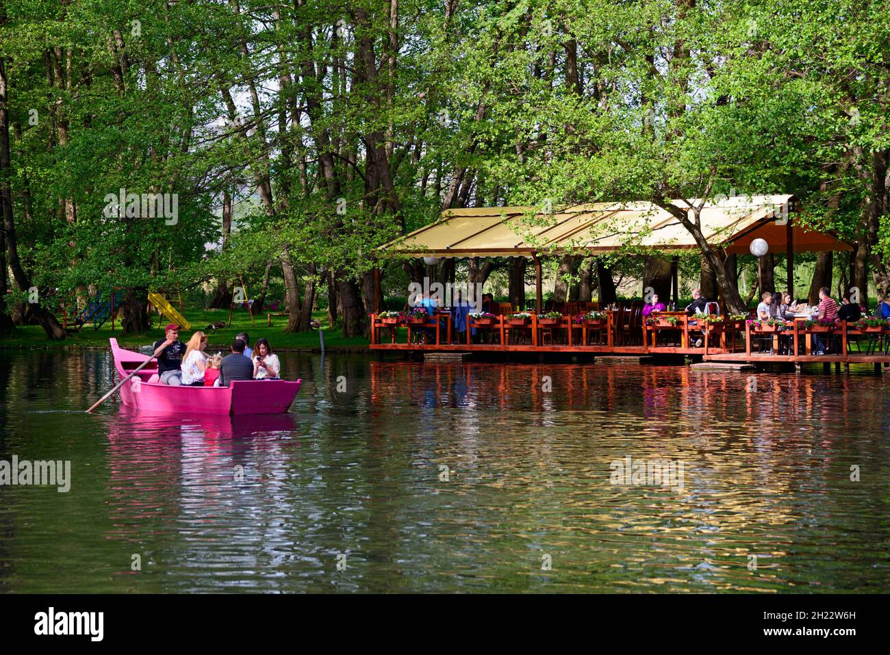 Lakeside restaurant, Tushemisht, headwaters of Lake Ohrid, Drilon National Park near Pogradec, Korca region, Korca, Albania Stock Photo