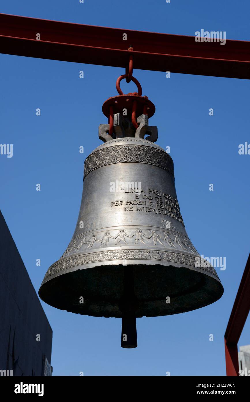 Bell near the Piramida, The Pyramid, former Enver Hoxha Museum, then cultural centre, now Top Channel TV station, Tirana, Albania Stock Photo