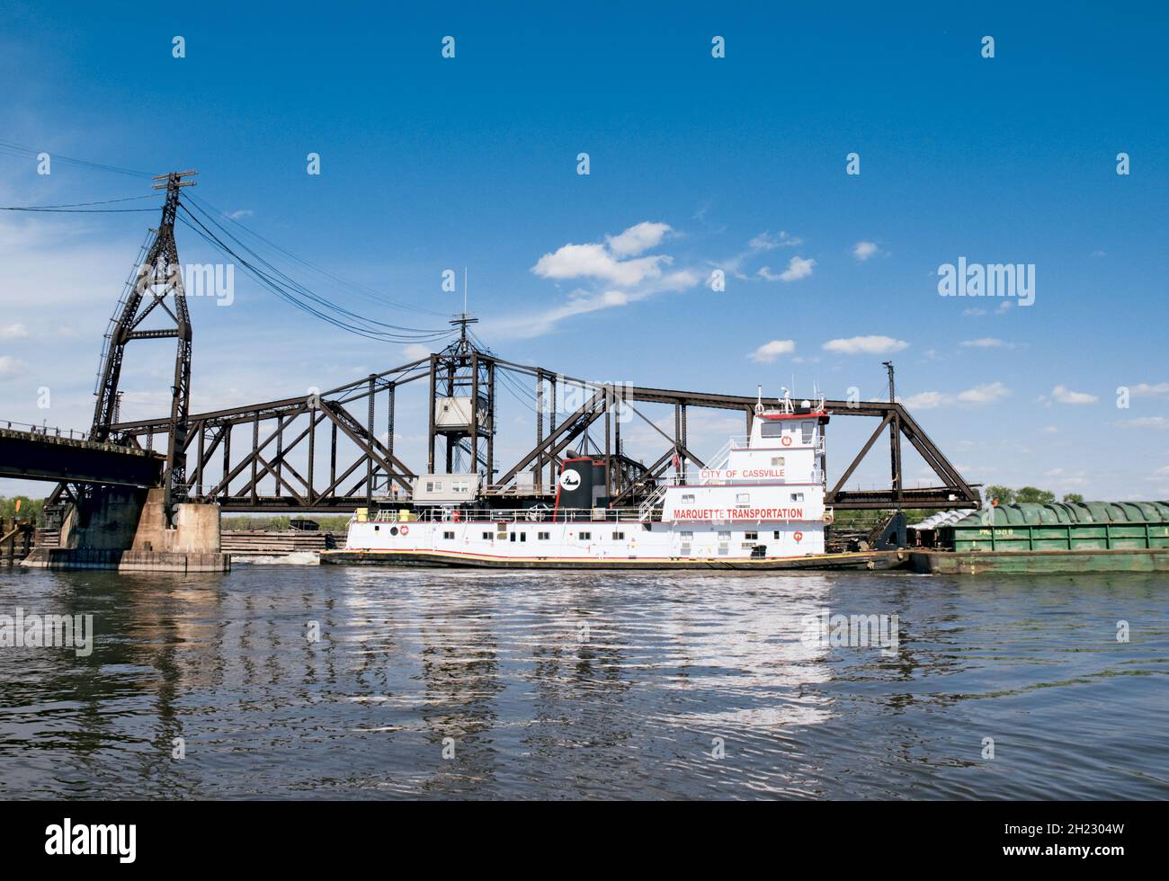 Tugboat and Barge at Sabula Iowa Swingbridge Stock Photo